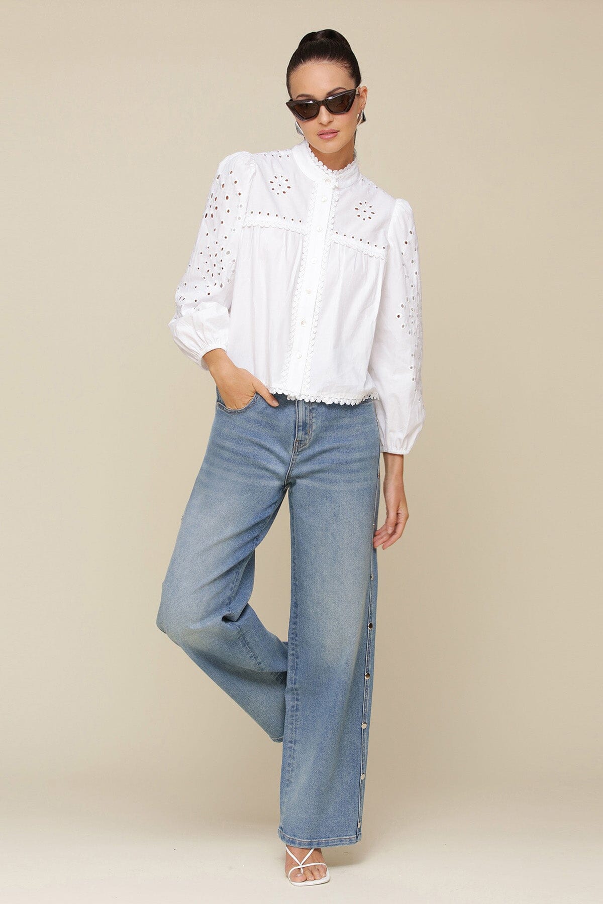 White eyelet embroidery cotton broderie anglaise blouse with long puff sleeves with elastic cuffs and button-front - Cute women's shirts by Avec Les Filles