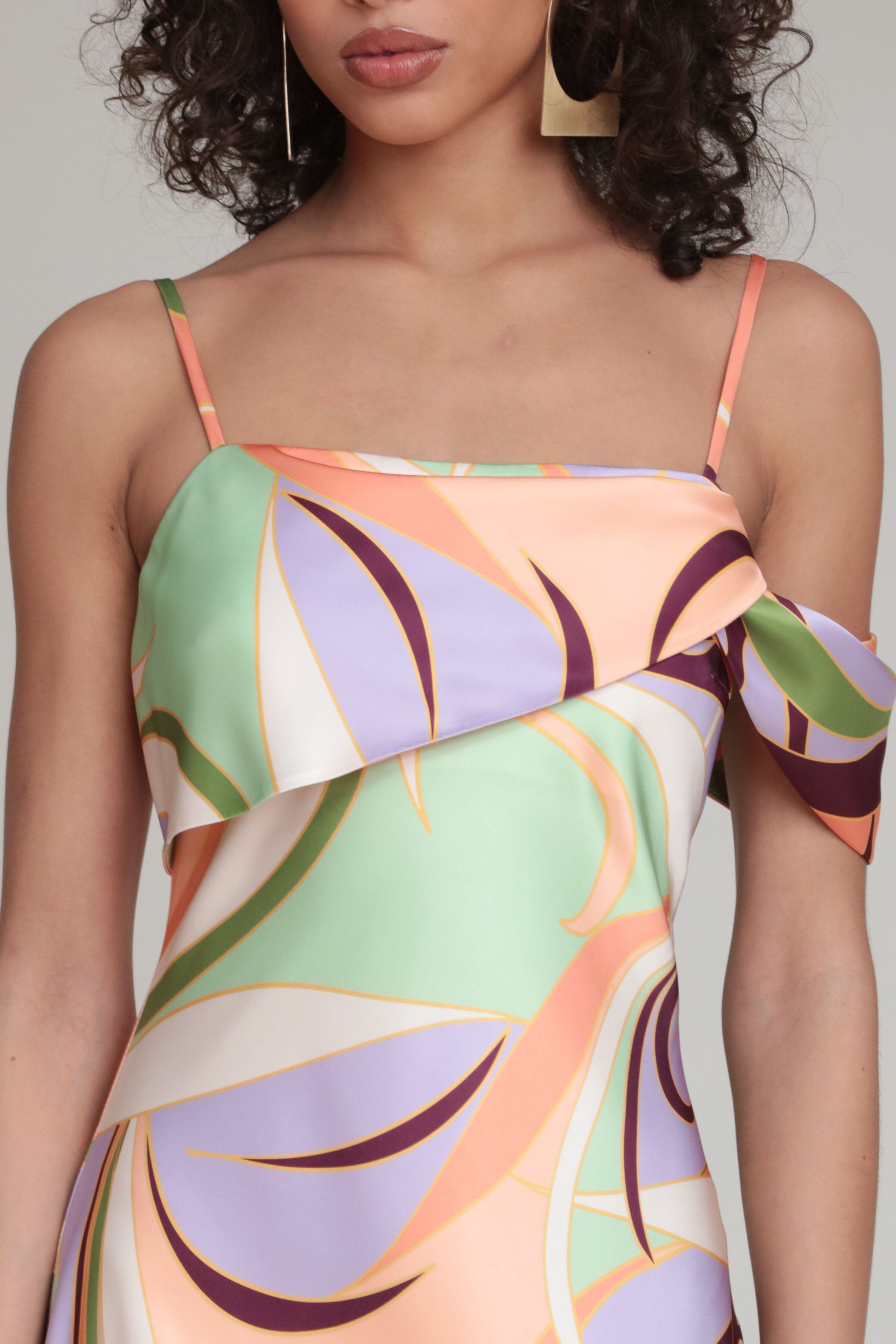 Asymmetrical bias cut satin maxi dress with adjustable straps. Shop cute party, wedding guest dresses by Avec Les Filles.