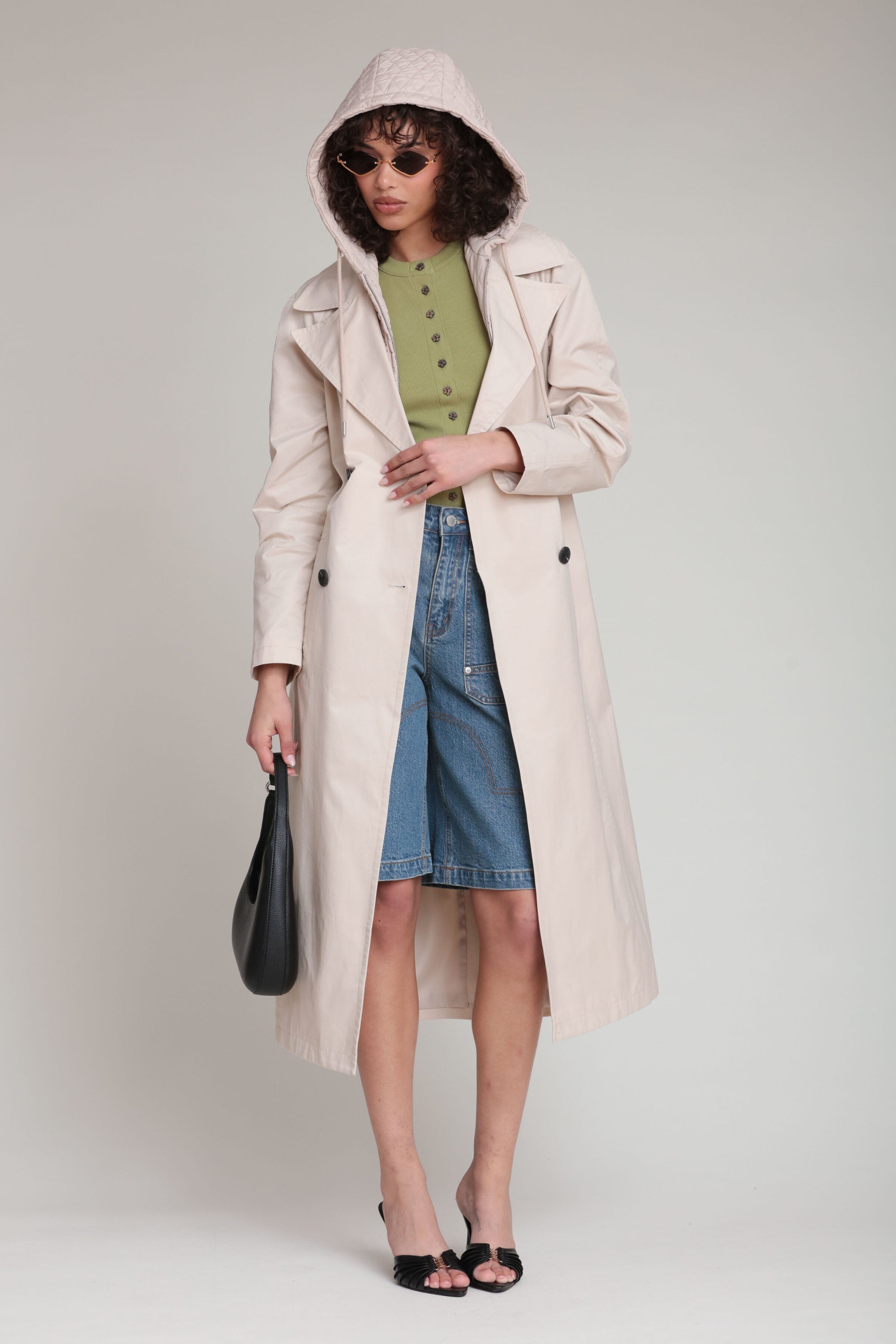 Cotton nylon double-breasted front ivory midi trench coat with detachable quilted hooded and waist self-tie belt by Avec Les Filles