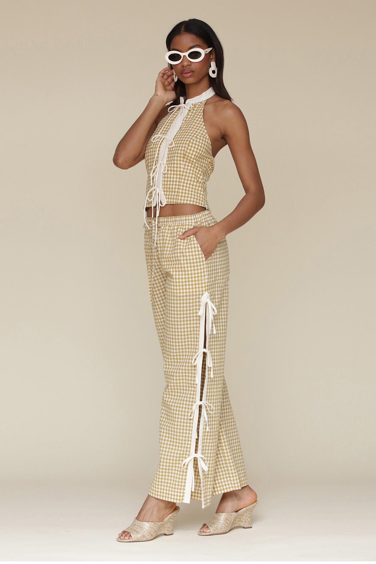 Brown olio gingham ramie blend bow detail wide leg pants with elastic waistband, drawstring tie and Functional side vents with adjustable ties - Cute women's pants by Avec Les Filles
