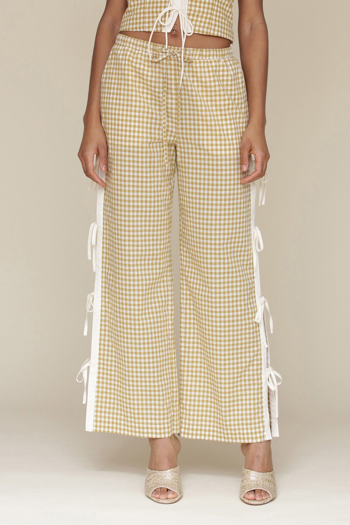 Brown olio gingham ramie blend bow detail wide leg pants with elastic waistband, drawstring tie and Functional side vents with adjustable ties - Cute women's pants by Avec Les Filles