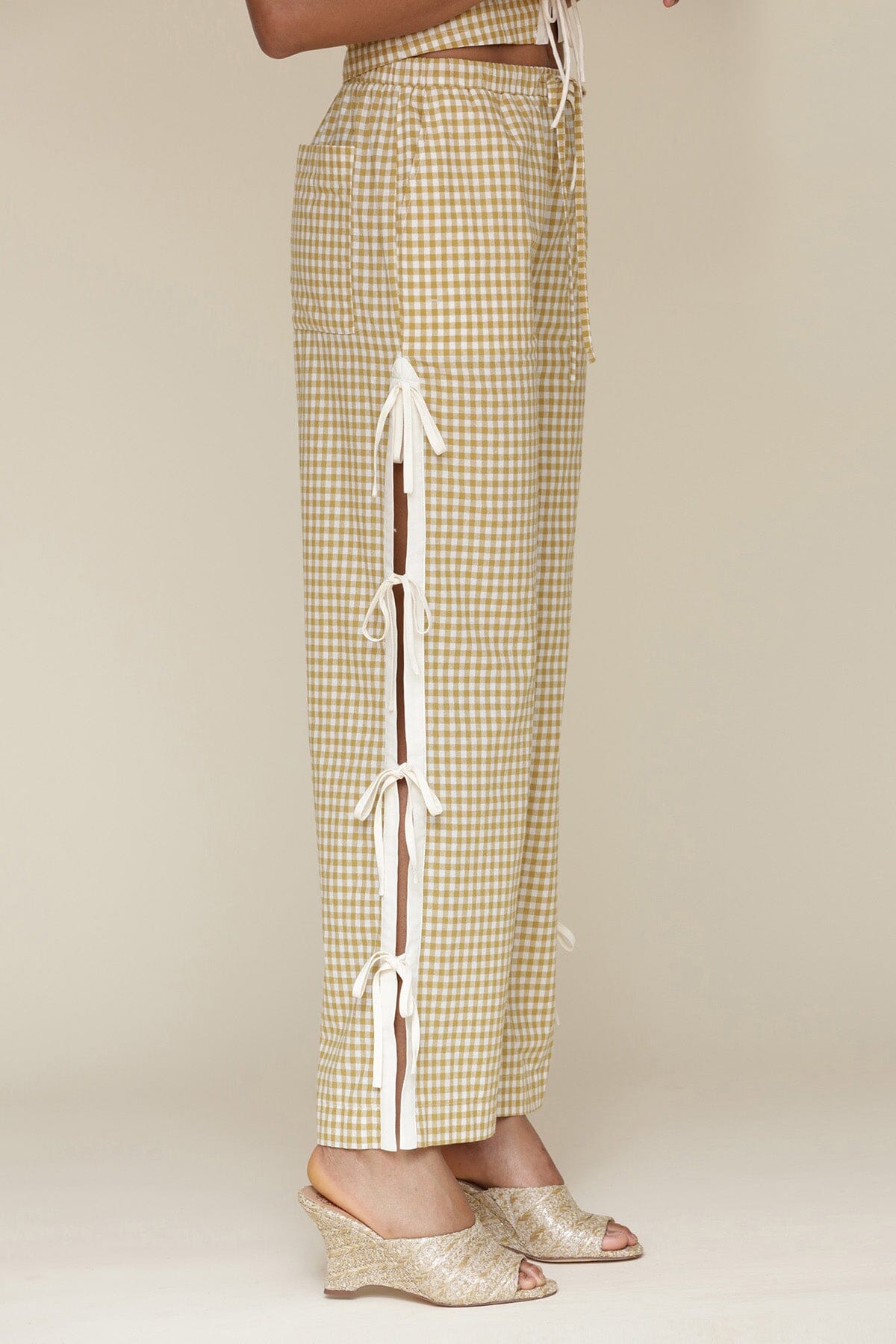 Brown olio gingham ramie blend bow detail wide leg pants with elastic waistband, drawstring tie and Functional side vents with adjustable ties - Cute women's pants by Avec Les Filles