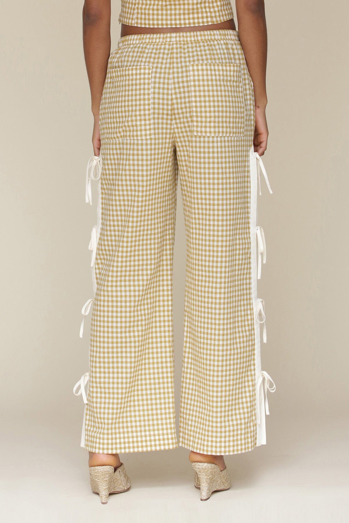 Brown olio gingham ramie blend bow detail wide leg pants with elastic waistband, drawstring tie and Functional side vents with adjustable ties - Cute women's pants by Avec Les Filles