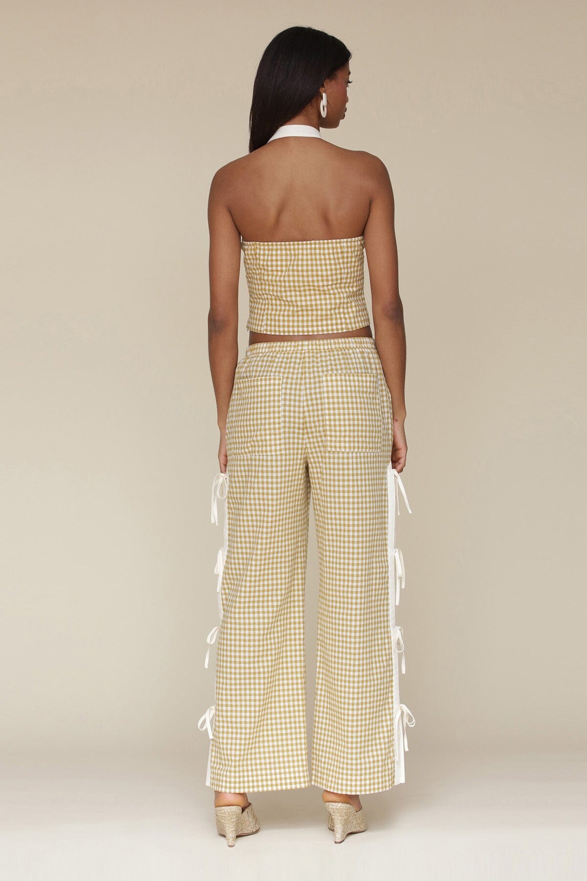 Brown olio gingham ramie blend bow detail wide leg pants with elastic waistband, drawstring tie and Functional side vents with adjustable ties - Cute women's pants by Avec Les Filles