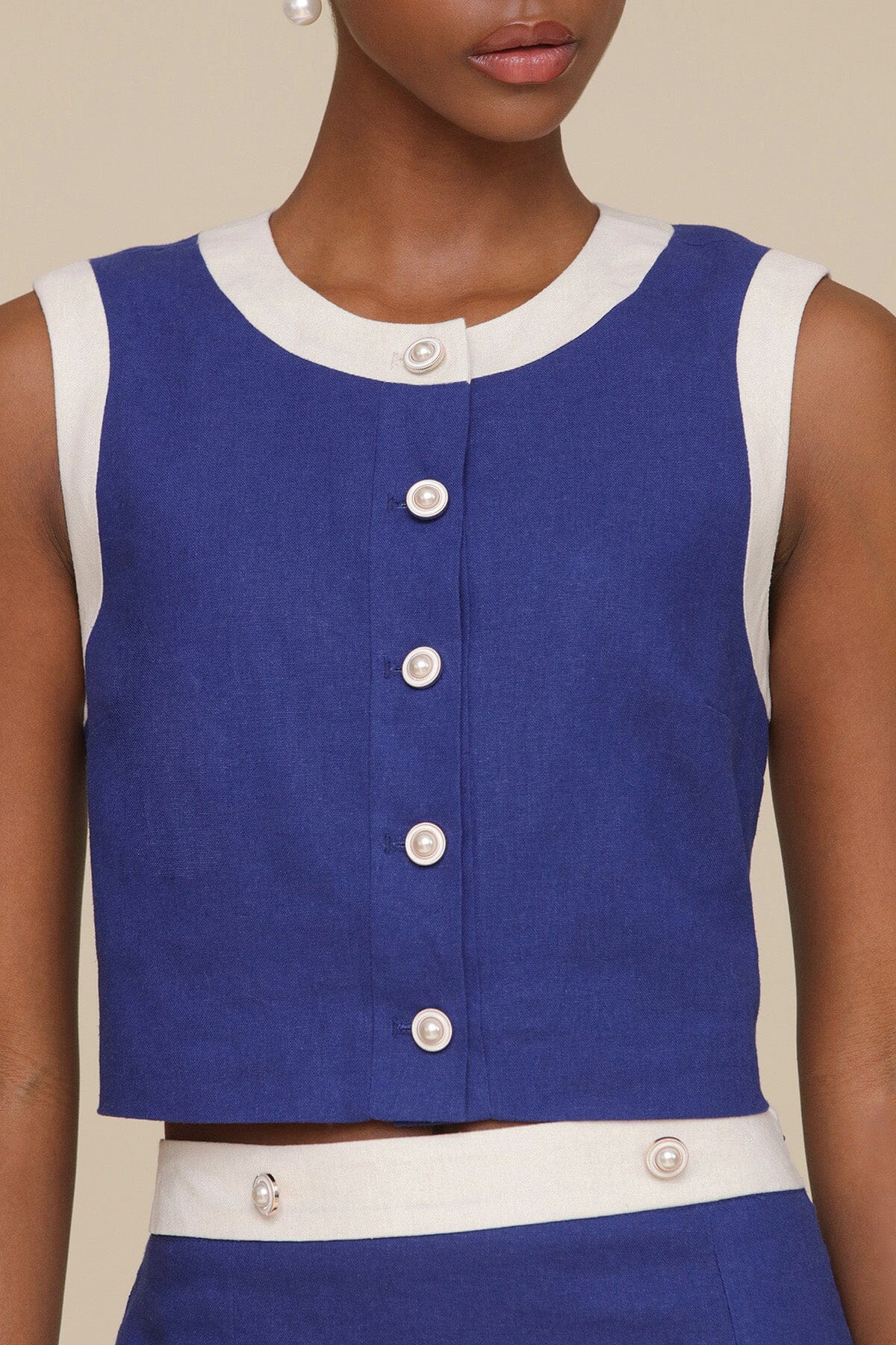 Navy blue linen blend vest sleeveless crop top with crew neckline and button-front closure with pearlized buttons - Cute women's tops by Avec Les Filles