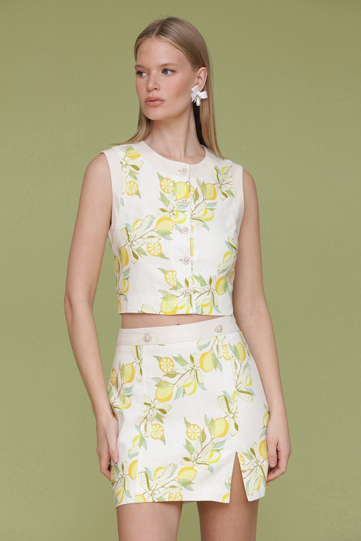 White lemon vine linen blend vest sleeveless crop top with crew neckline 
and button-front closure with pearlized buttons - Cute women's tops by Avec Les Filles
