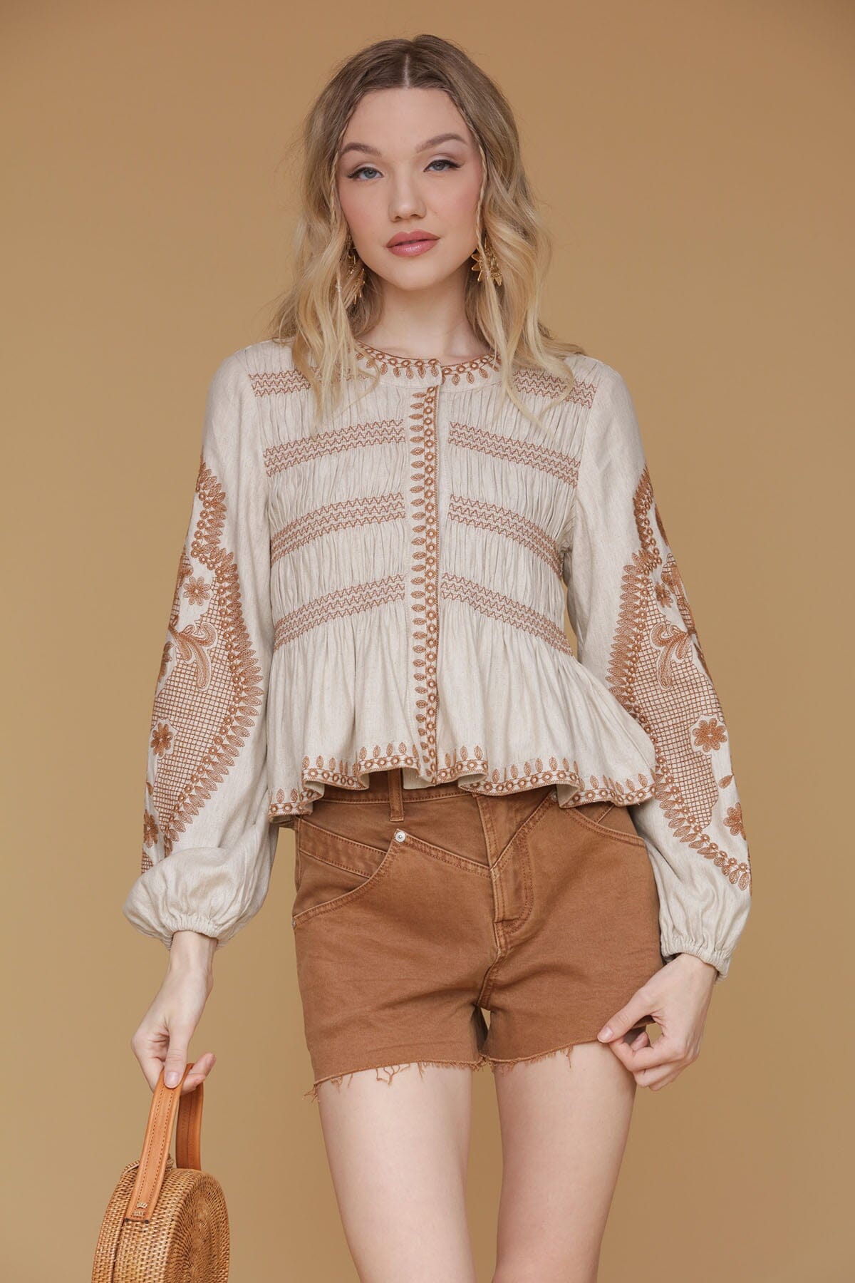 White floral embroidered linen blend peplum top with round neckline and long puff sleeves with elastic cuffs - Cute womens tops by Avec Les Filles