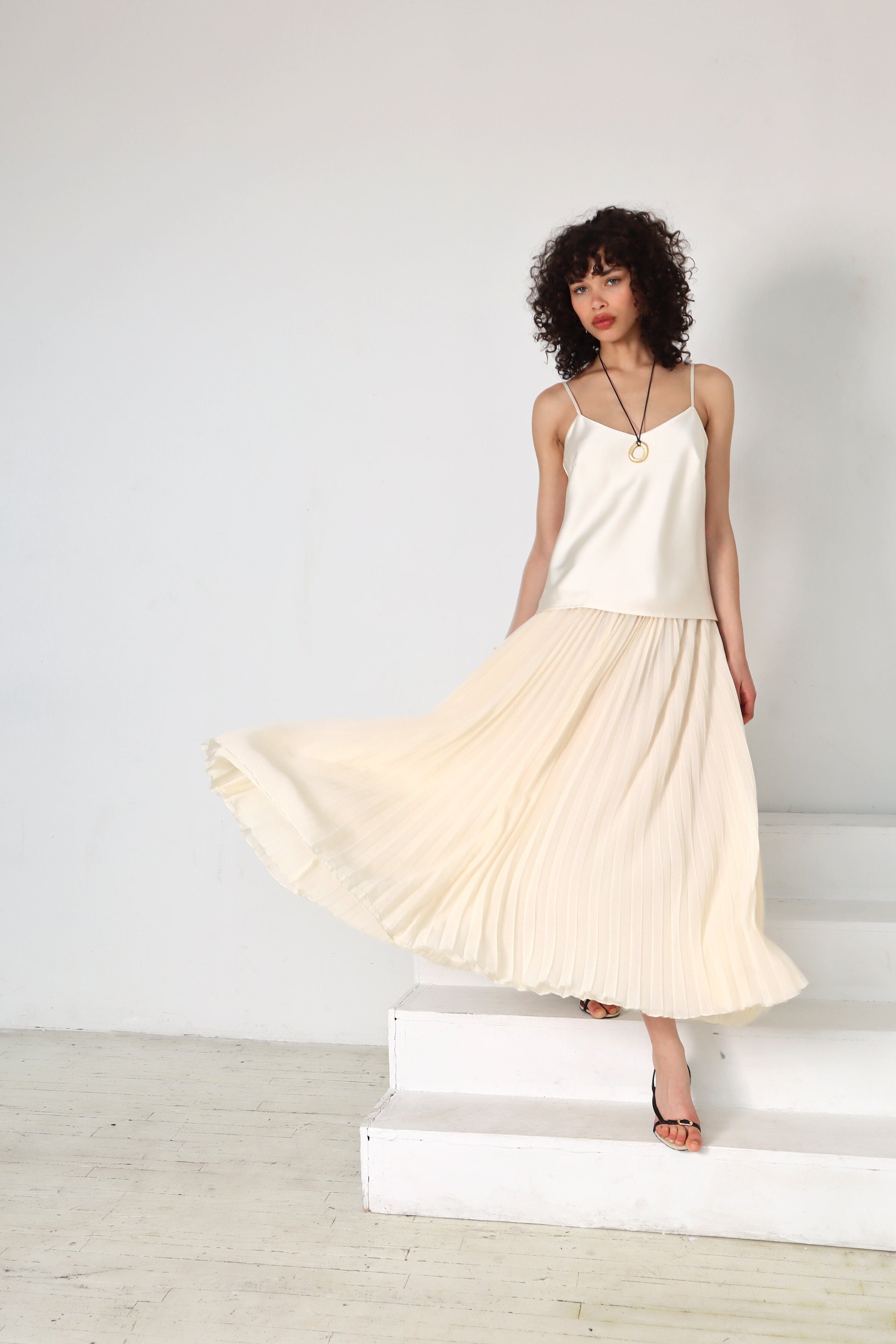 Cream satin drop-waist pleated maxi dress with adjustable spaghetti straps and v-neckline - Cute women's maxi dresses by Avec Les Filles