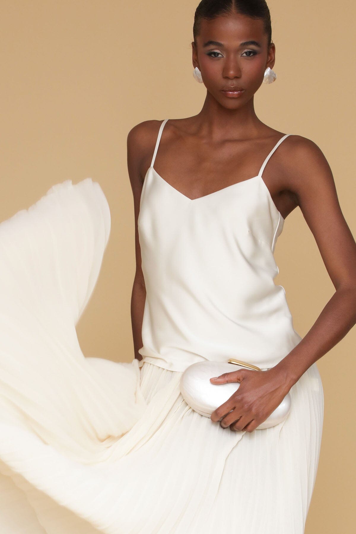 Cream satin drop-waist pleated maxi dress with adjustable spaghetti straps and v-neckline - Cute women's maxi dresses by Avec Les Filles