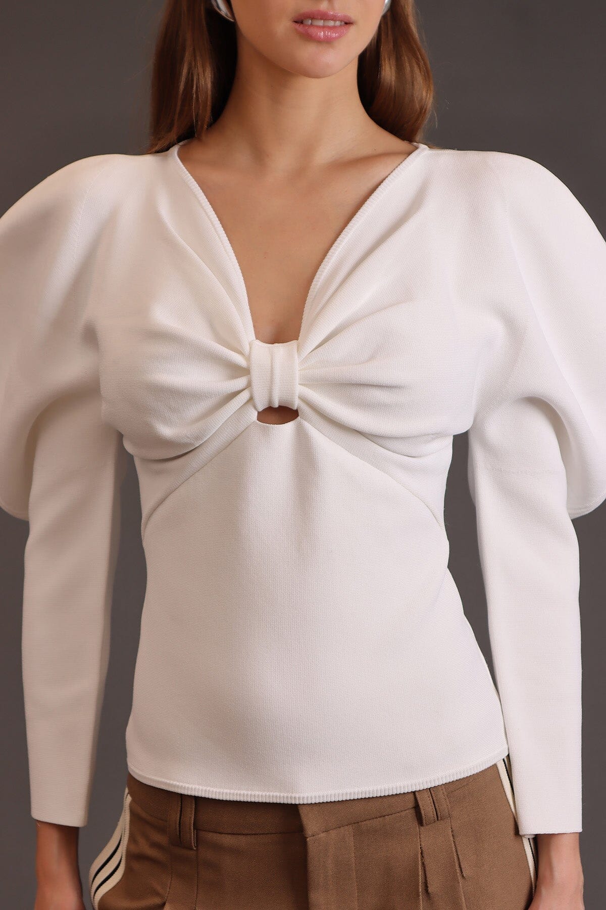 Puff sleeve bow front cream slim-fitting sweater made from viscose nylon blend with V-neckline and long sleeves - Cute women's sweater by Avec Les Filles