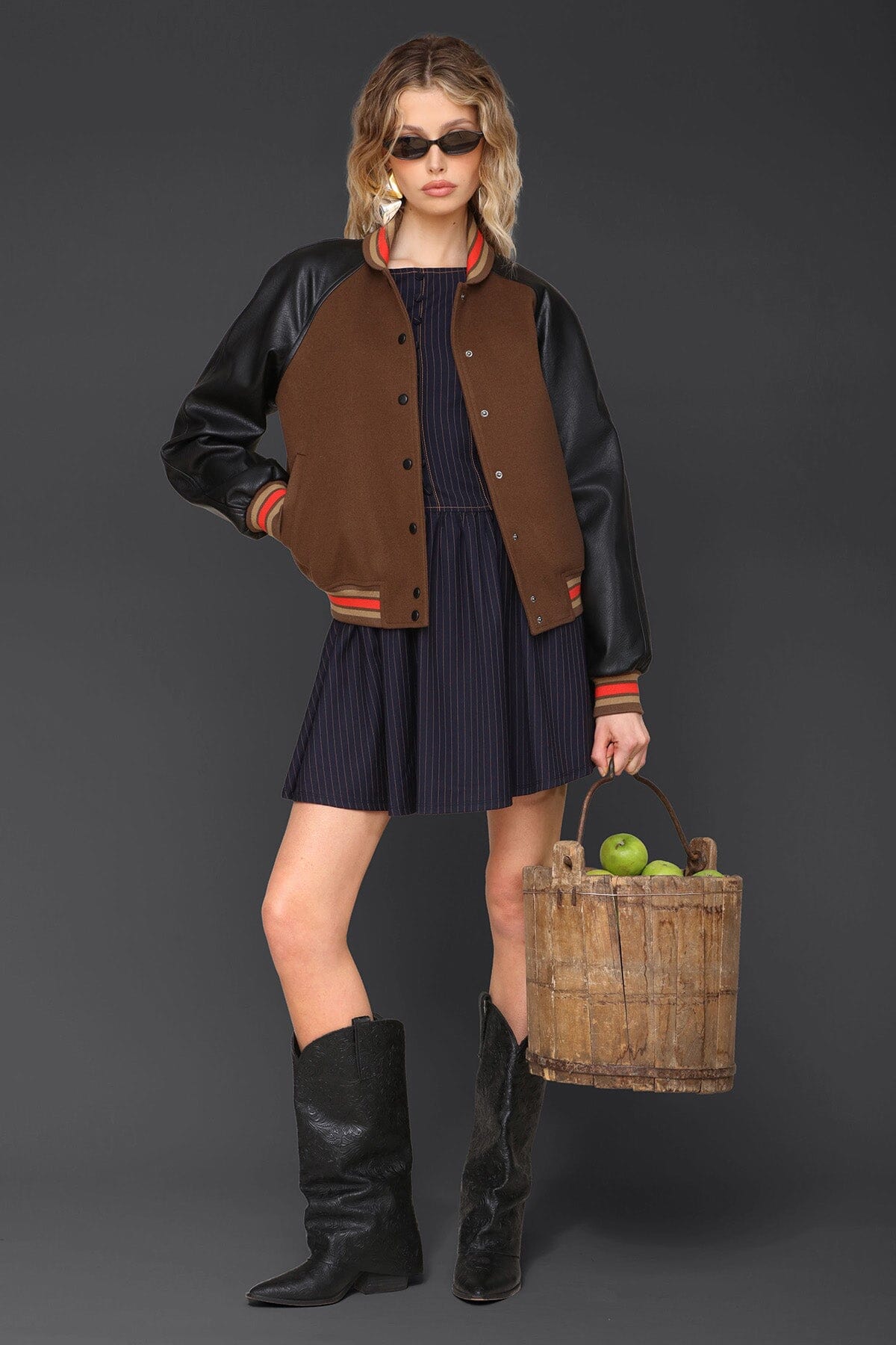 Novelty rodeo brown black varsity bomber jacket with snap‑button front, raglan faux‑leather sleeves and striped rib collar - Cute women's jackets by Avec Les Filles