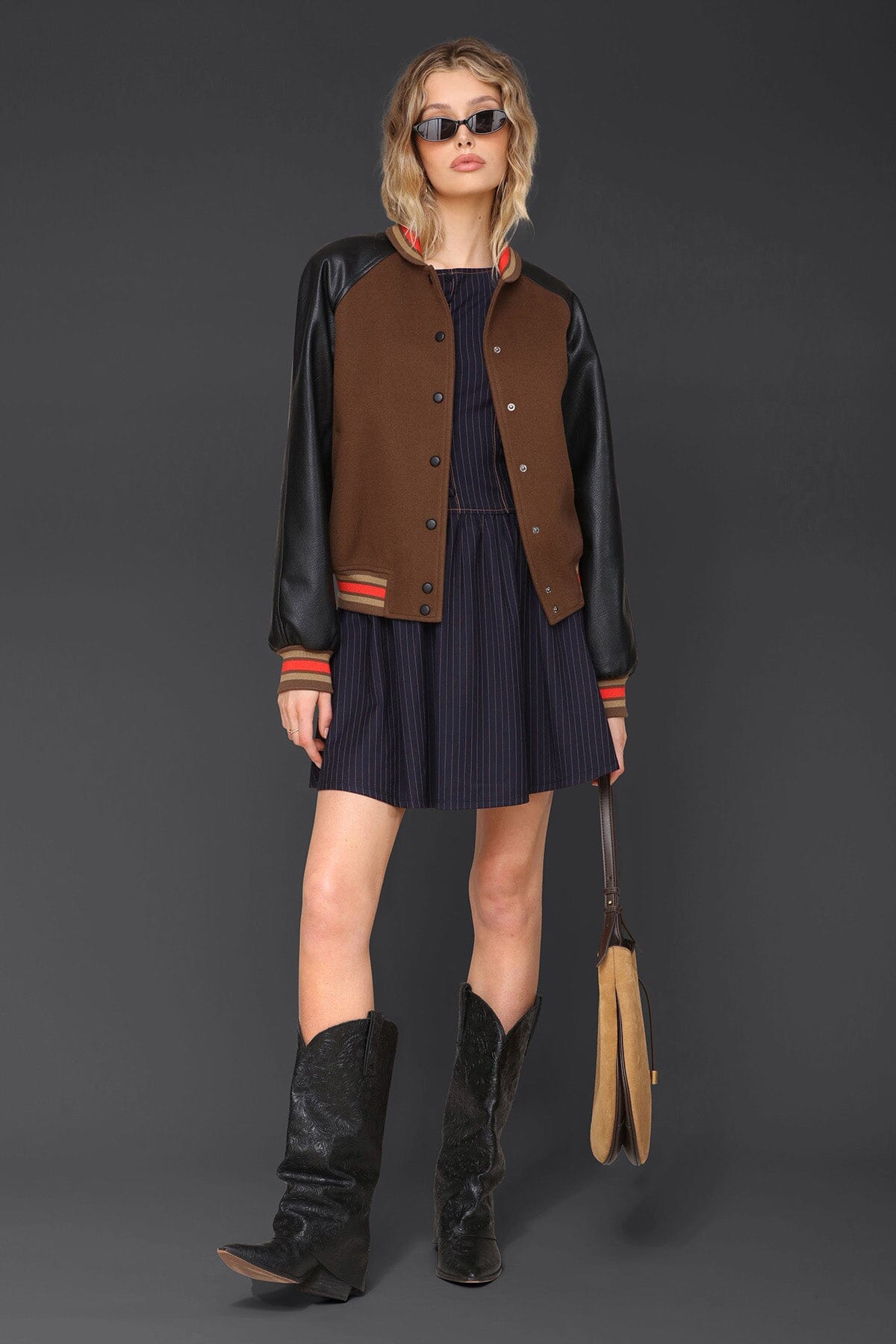Novelty rodeo brown black varsity bomber jacket with snap‑button front, raglan faux‑leather sleeves and striped rib collar - Cute women's jackets by Avec Les Filles