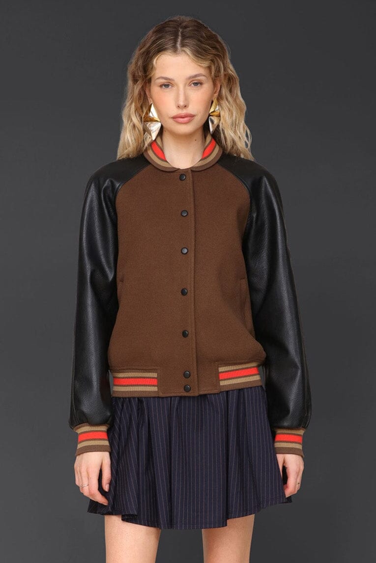 Novelty rodeo brown black varsity bomber jacket with snap‑button front, raglan faux‑leather sleeves and striped rib collar - Cute women's jackets by Avec Les Filles