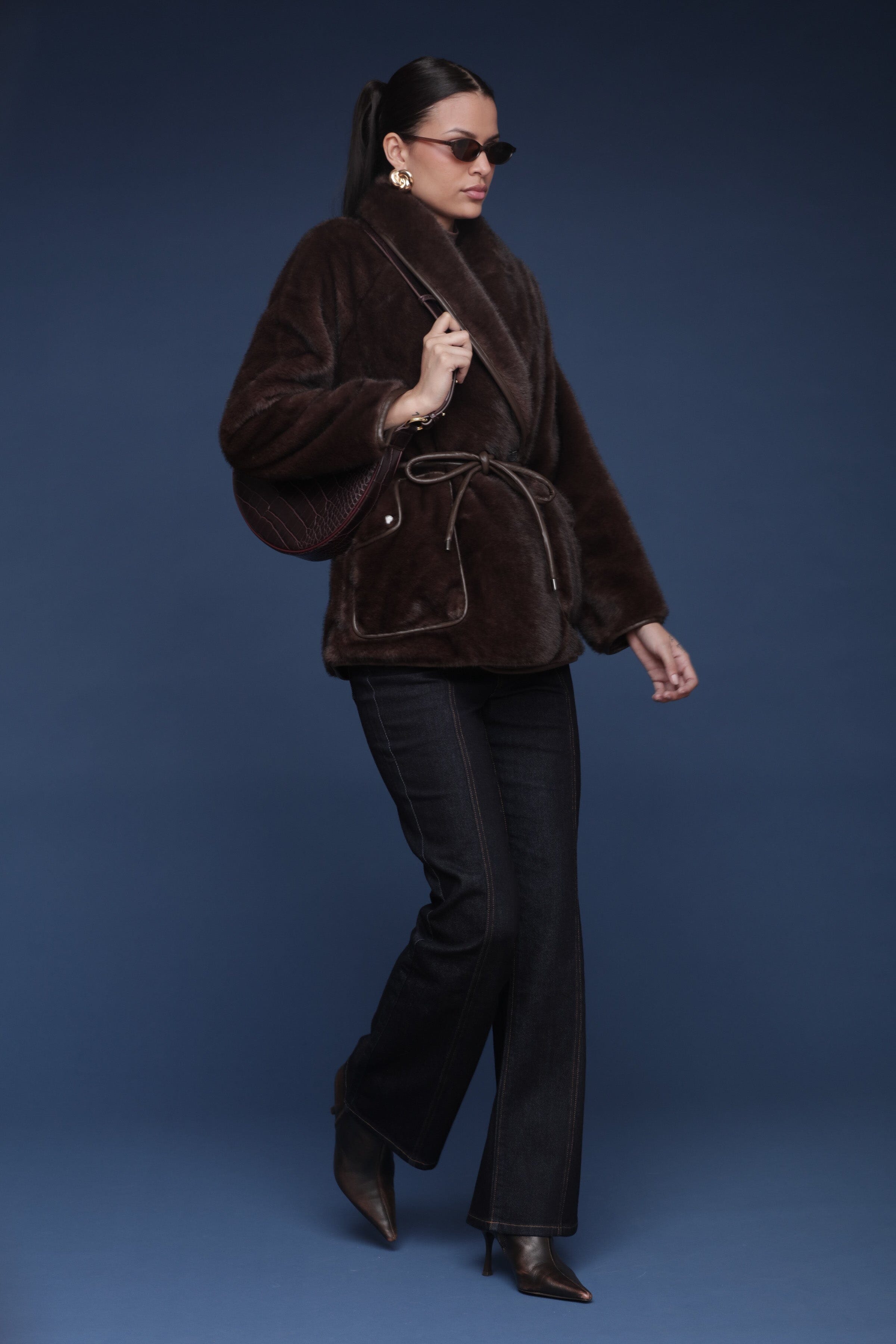 Brown faux fur button-front coat with a shawl collar, detachable belt, and side patch pockets - Shop cute women’s coats by Avec Les Filles