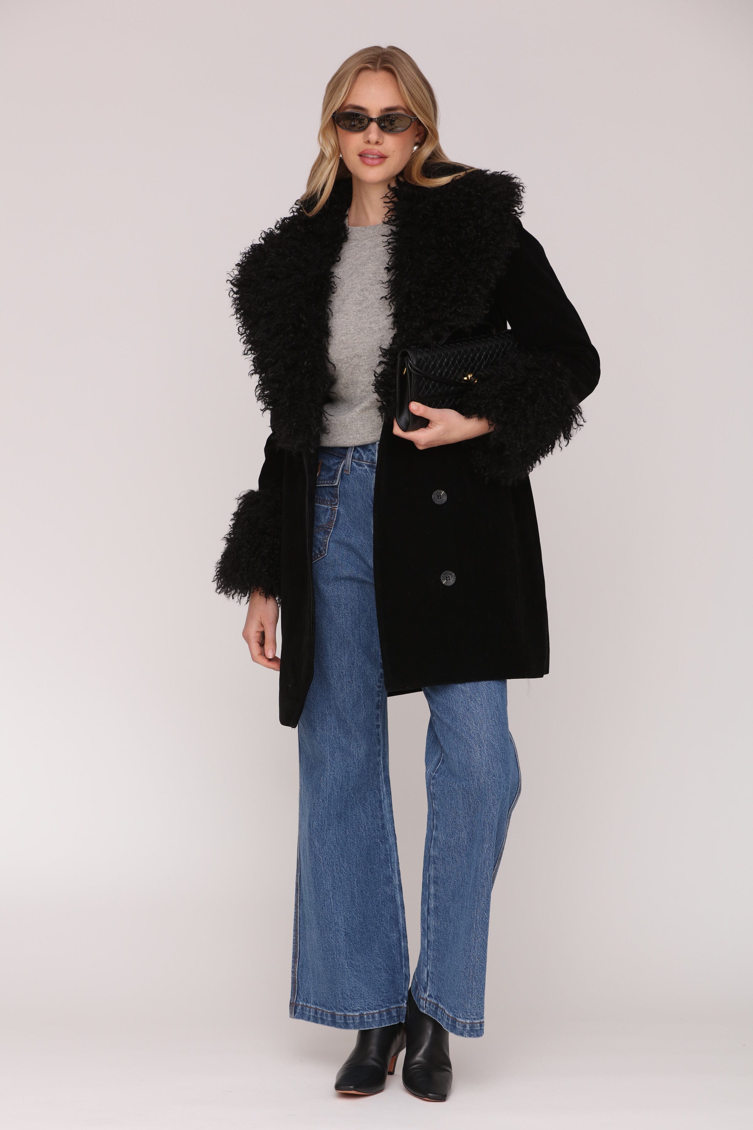 Black faux suede double-breasted button-front coat with Mongolian faux fur trim, plush faux fur collar and side pockets - Shop women’s coats by Avec Les Filles