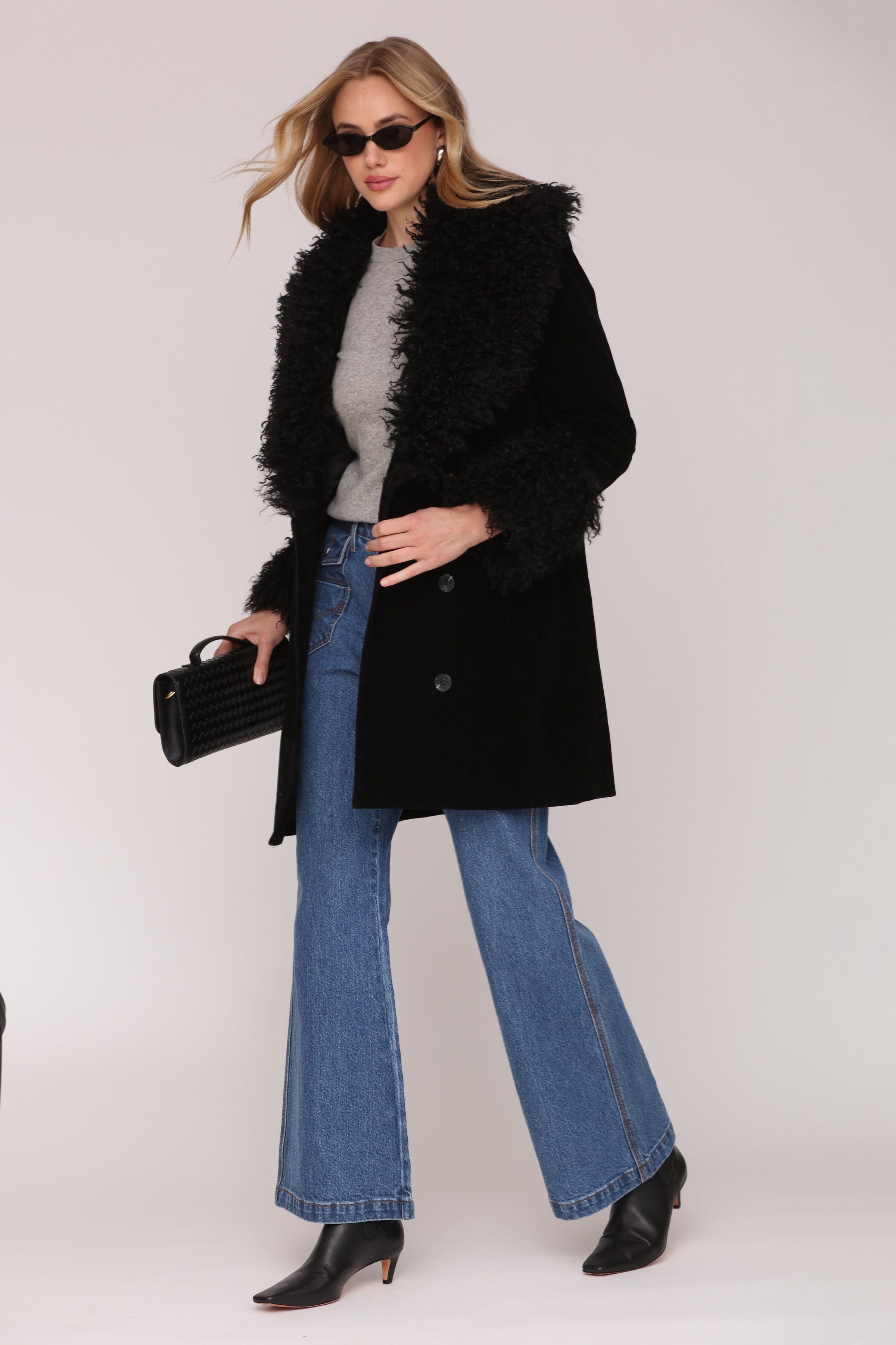 Black faux suede double-breasted button-front coat with Mongolian faux fur trim, plush faux fur collar and side pockets - Shop women’s coats by Avec Les Filles