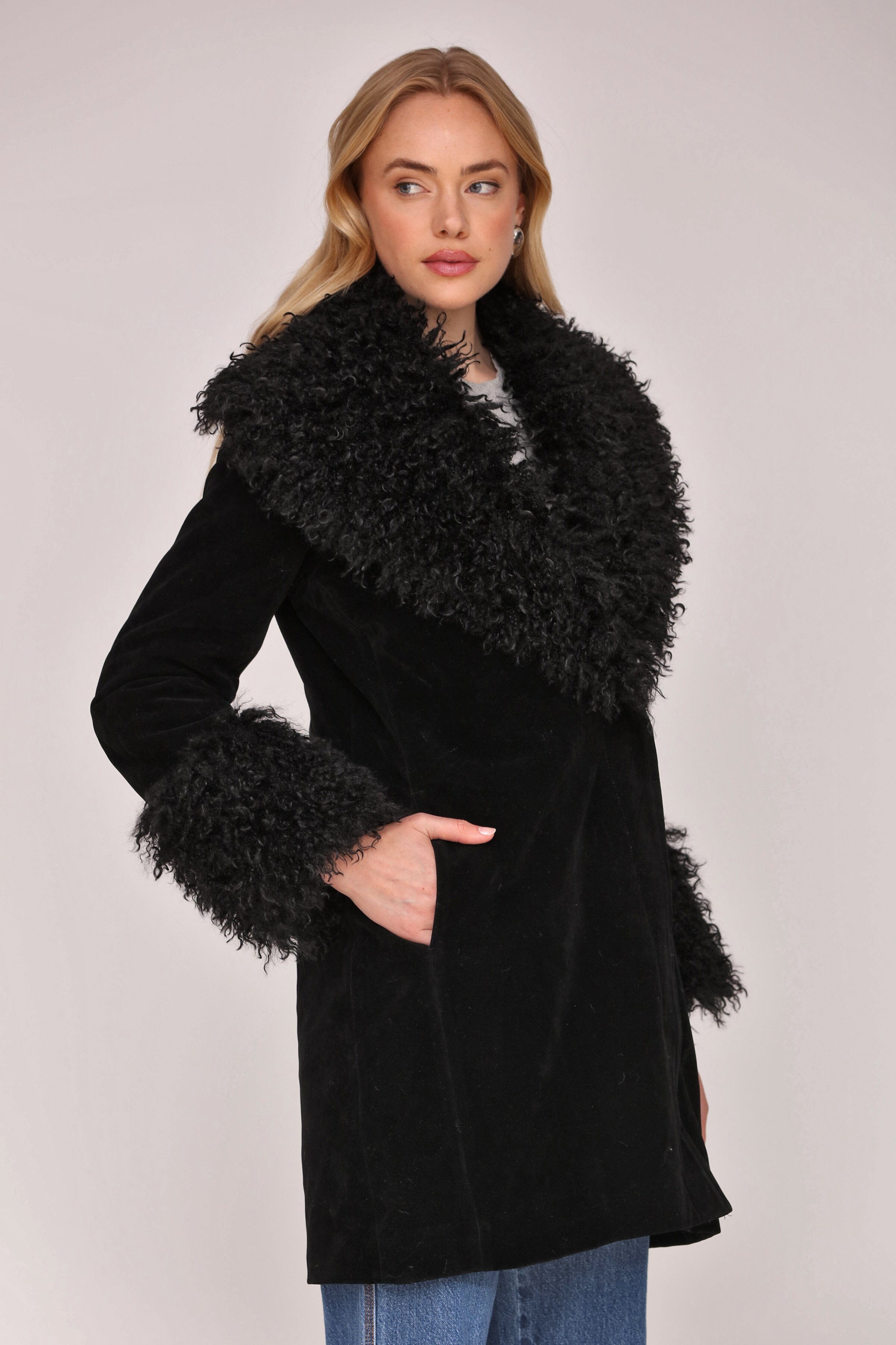 Black faux suede double-breasted button-front coat with Mongolian faux fur trim, plush faux fur collar and side pockets - Shop women’s coats by Avec Les Filles
