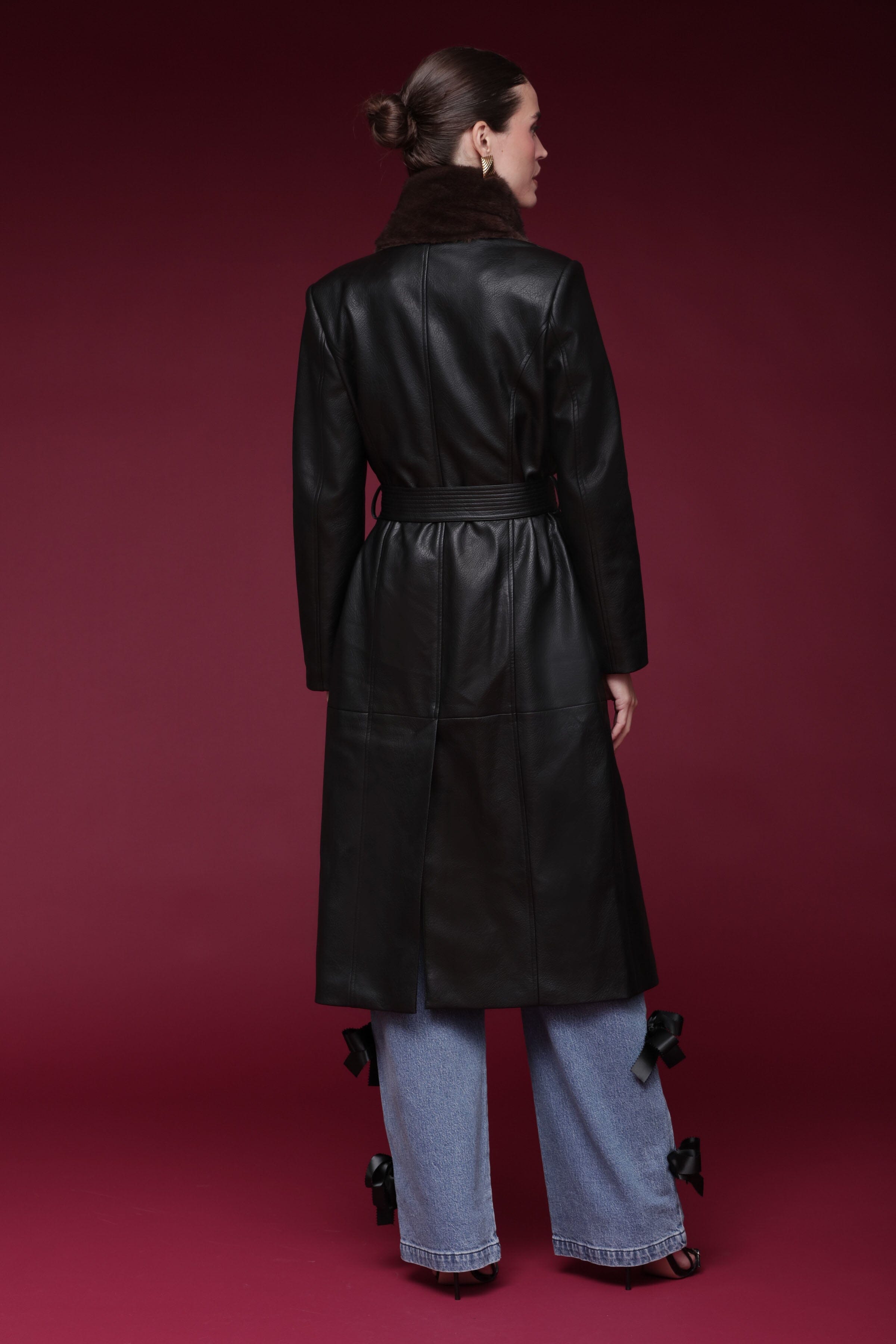 Fur-trimmed faux leather black wrap coat with a wide faux fur shawl collar, self-tie belt, and side pockets - Shop designer long wrap coats by Avec Les Filles
