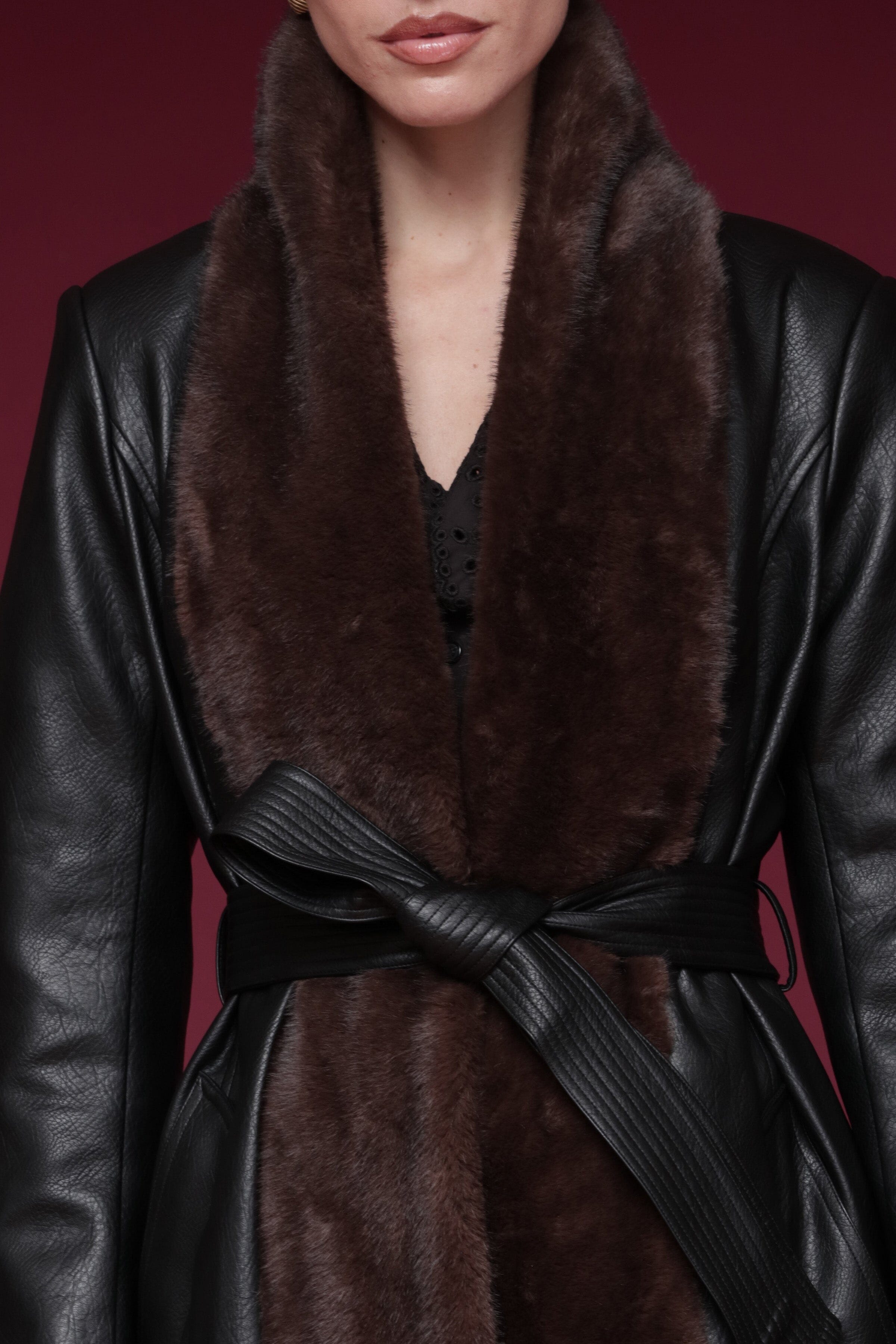 Fur-trimmed faux leather black wrap coat with a wide faux fur shawl collar, self-tie belt, and side pockets - Shop designer long wrap coats by Avec Les Filles