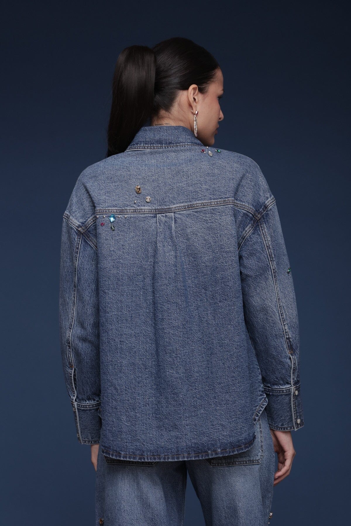 Bejeweled denim cotton-blend blue shirt with jewel embellishments, a relaxed fit, long sleeves and a pointed collar - Shop women’s shirts by Avec Les Filles