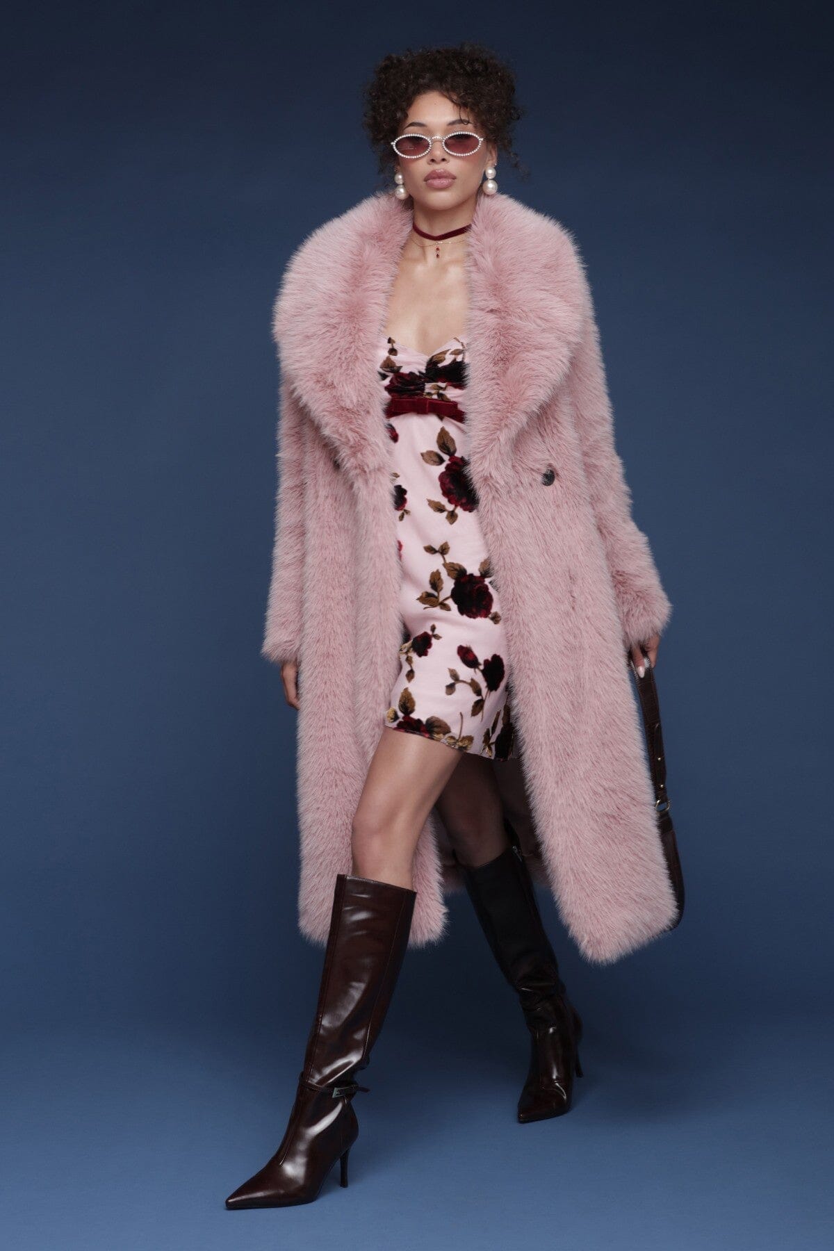 Oversized faux fur double-breasted pink midi coat with a wide notched lapel collar and side welt pockets - Shop designer women’s midi coats by Avec Les Filles.