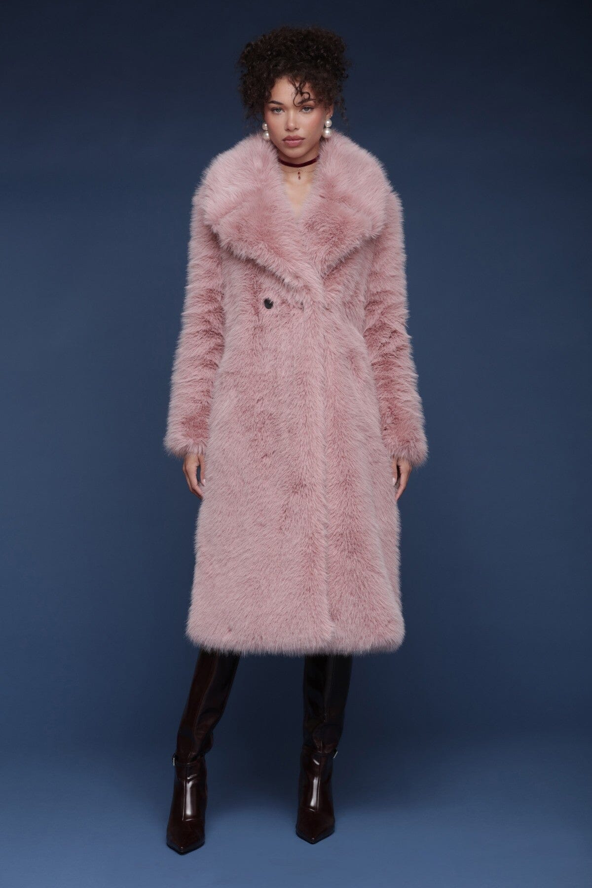 Oversized faux fur double-breasted pink midi coat with a wide notched lapel collar and side welt pockets - Shop designer women’s midi coats by Avec Les Filles.