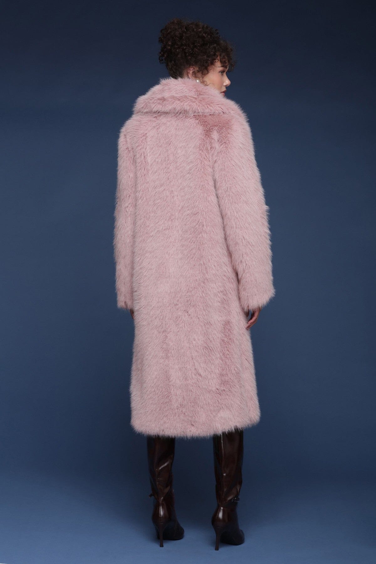 Oversized faux fur double-breasted pink midi coat with a wide notched lapel collar and side welt pockets - Shop designer women’s midi coats by Avec Les Filles.