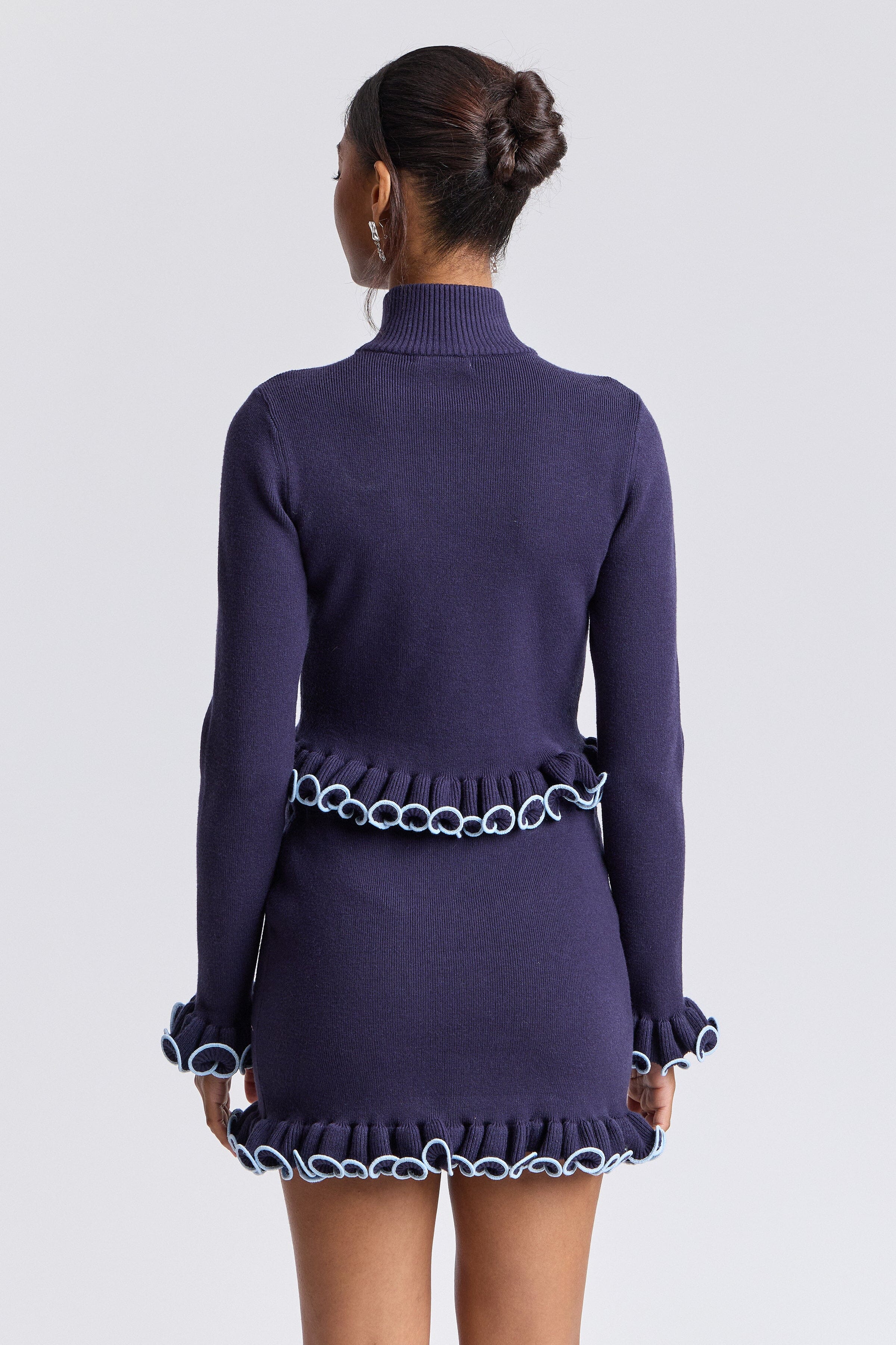 Cropped navy blue mockneck sweater with ruffles and long sleeves - Shop women's ruffle tops by Avec Les Filles.