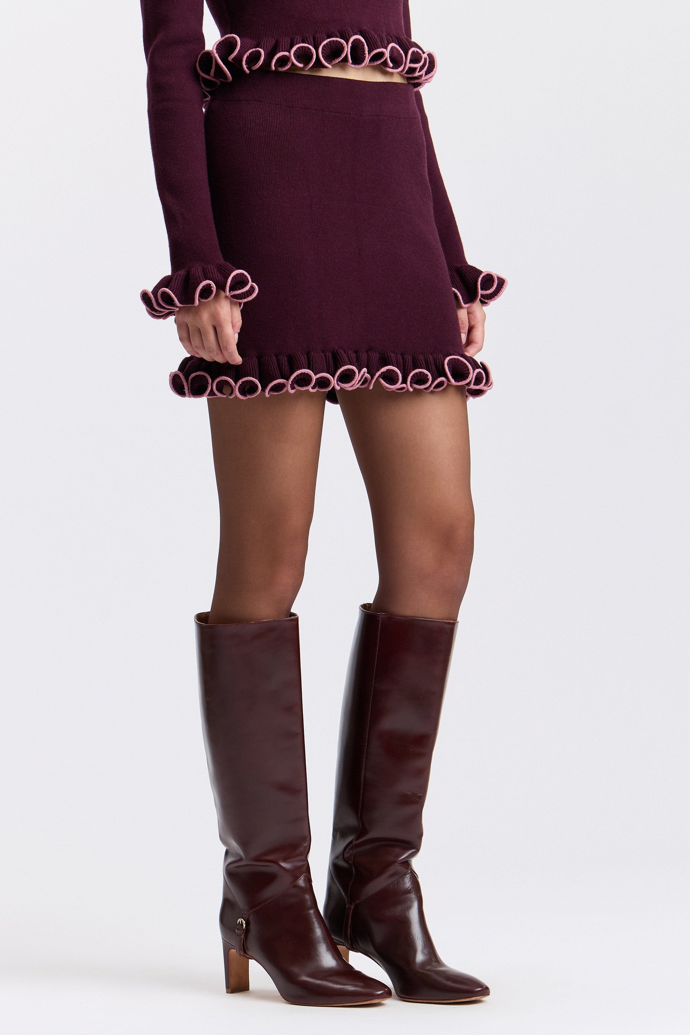 Ruffle-trim knit burgundy skirt mini with pull-on waistband - Shop designer women's mini skirts by Aves Les Filles. 