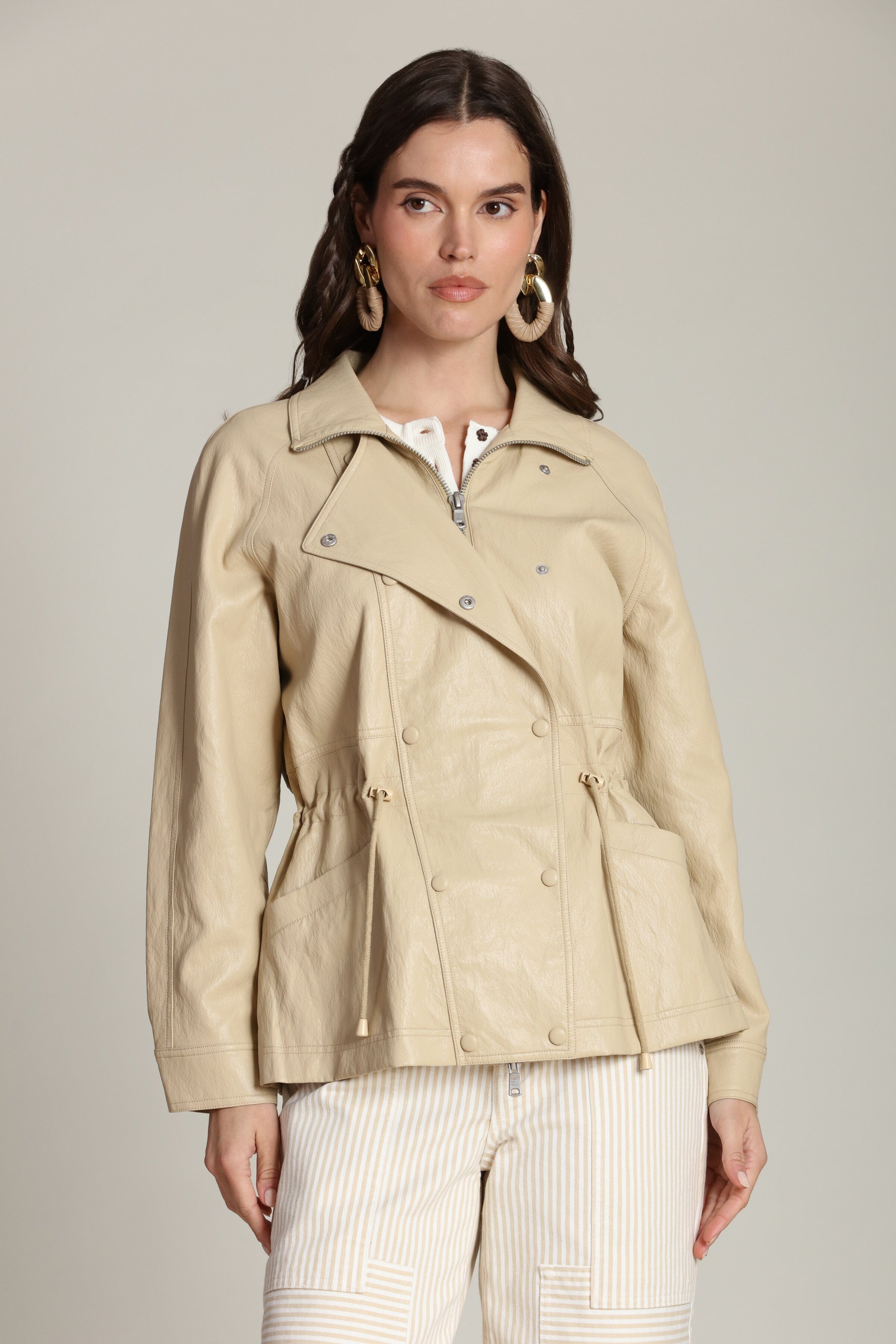 Cream faux leather anorak jacket for women with a drawstring by Avec Les Filles