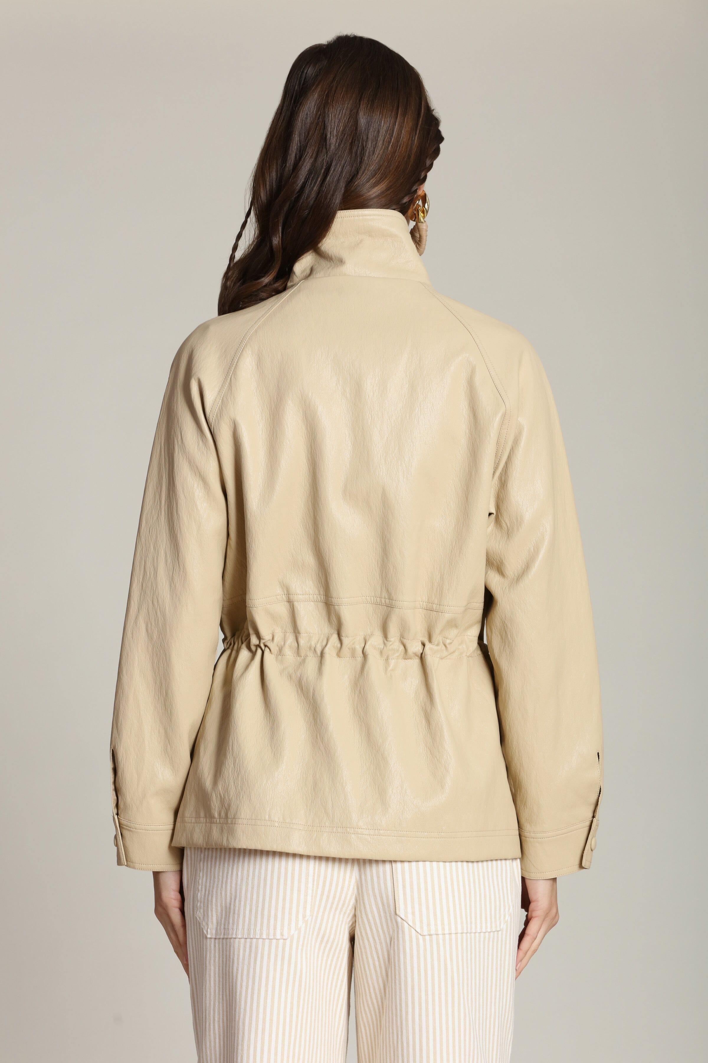 Tan anorak jacket for women with an adjustable drawstring by Avec Les Filles
