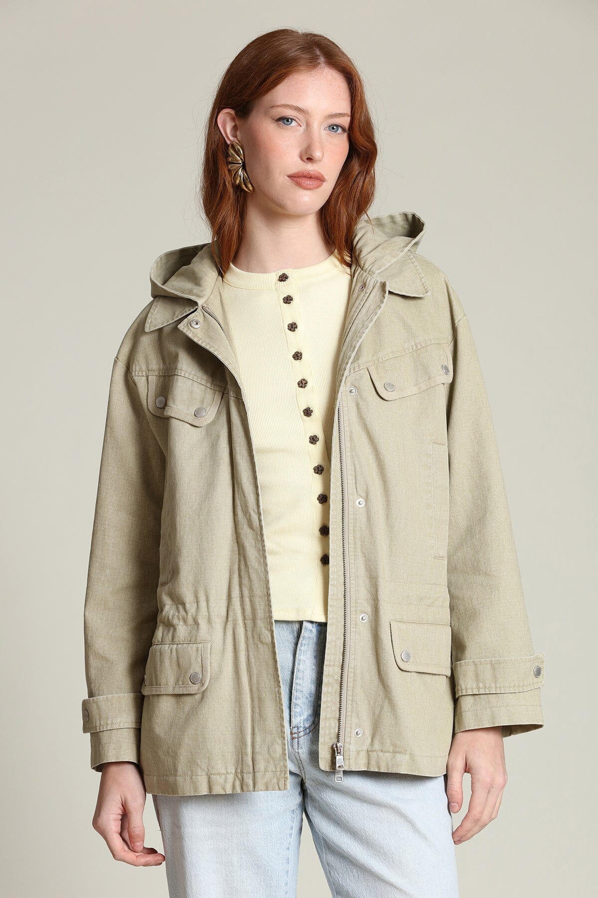 Cotton snap-front beige anorak jacket with long sleeves, attached hood and an adjustable drawstring waist - Shop designer jackets by Avec Les Filles