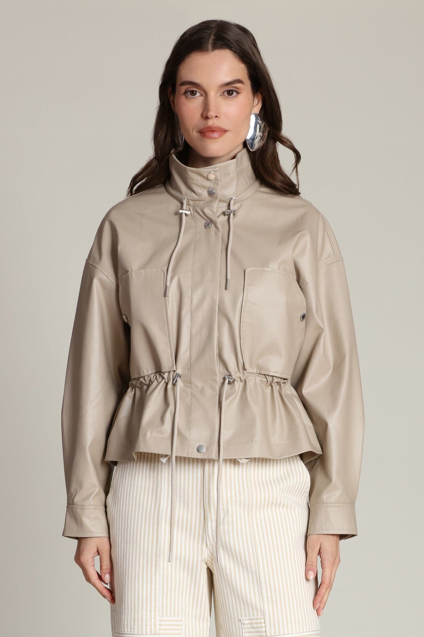 Faux leather cropped beige anorak jacket with snap-button front and adjustable drawstring waist - Women's coats & jackets by Avec Les Filles