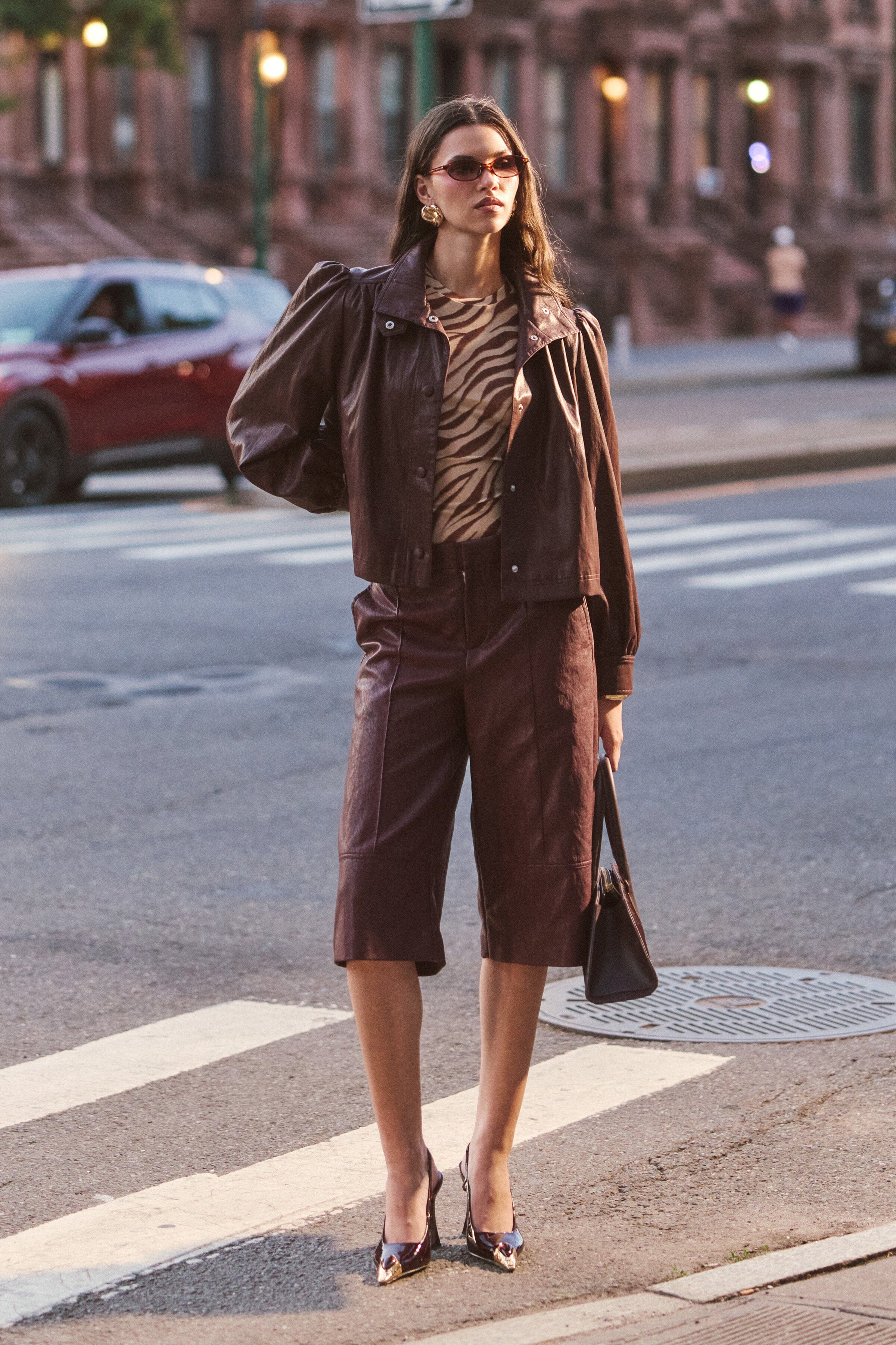 Ladies brown faux leather jacket with stand collar and long puff sleeves - Shop cute cropped jackets by Avec Les Filles.