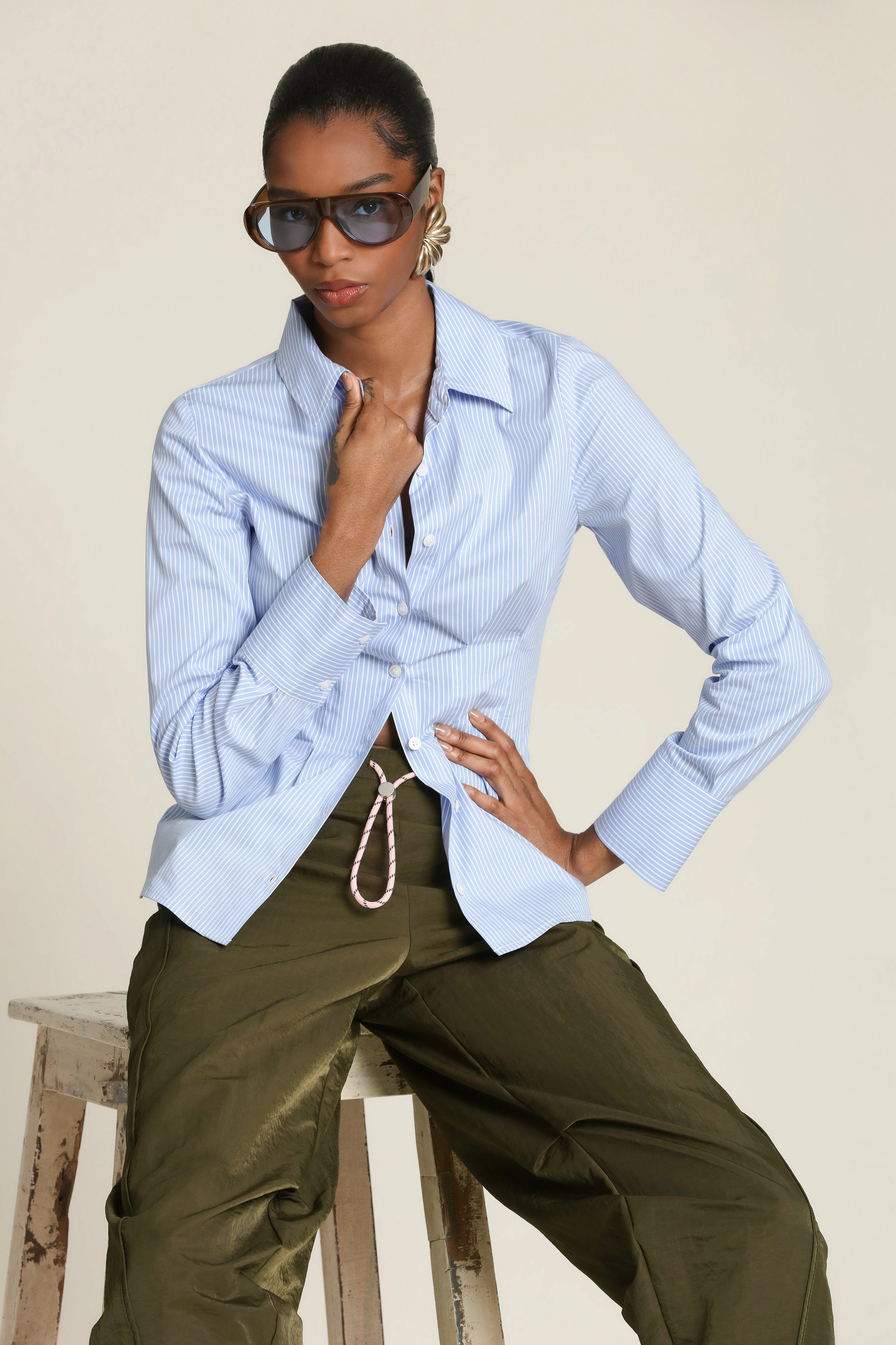 Cinch waist blue white cotton pinstripe shirt with a button-front by Avec Les Filles