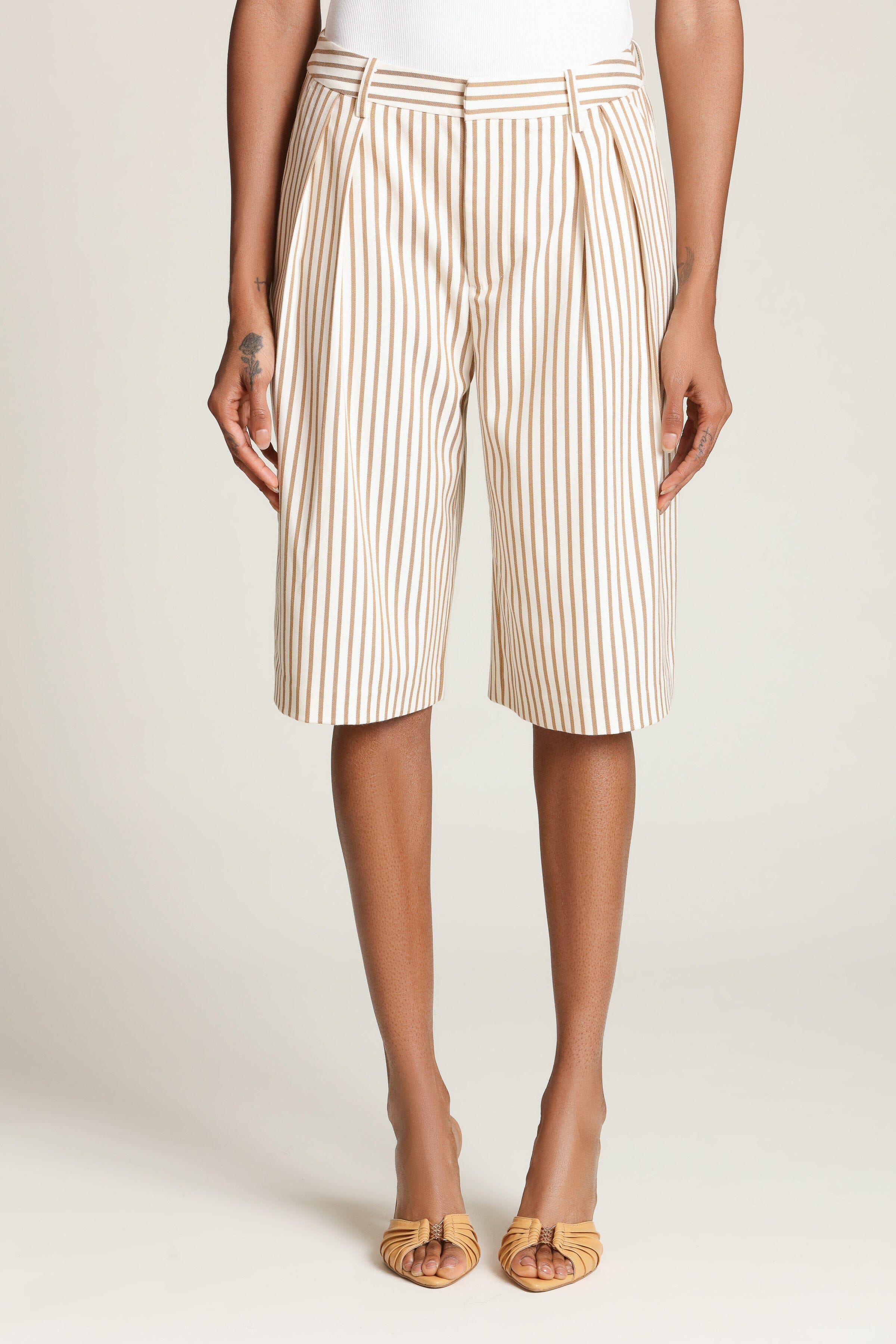 Striped boyfriend camel bermuda shorts with a high-rise waist, front pleats, and faux welt pockets - Shop designer women’s bermuda shorts by Avec Les Filles