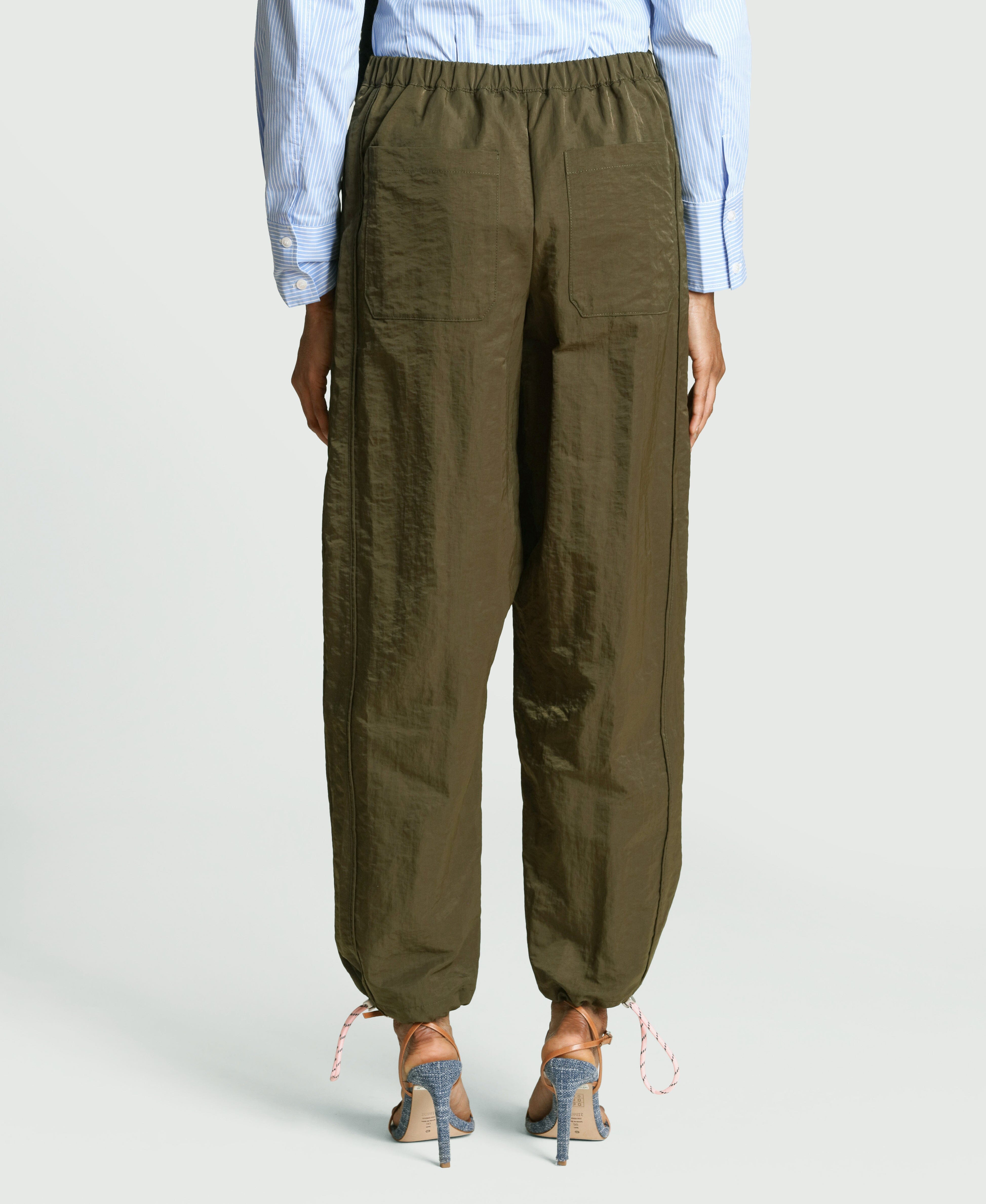 Nylon bungee cord brown joggers pant with balloon legs and adjustable drawcords by Avec Les Filles