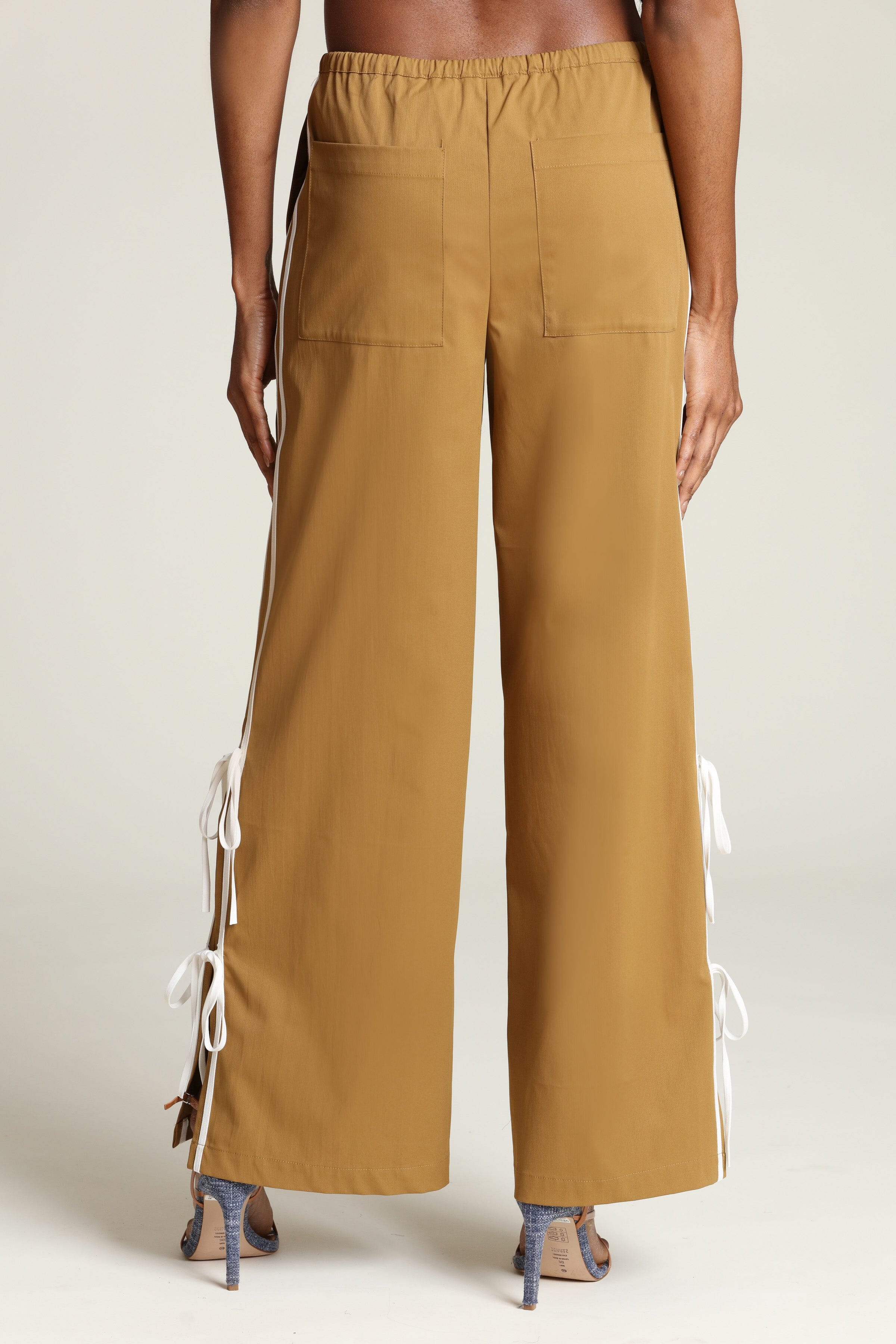 Side tie brown wide-leg track pants with an adjustable drawstring. Shop cute track pants by Avec Les Filles