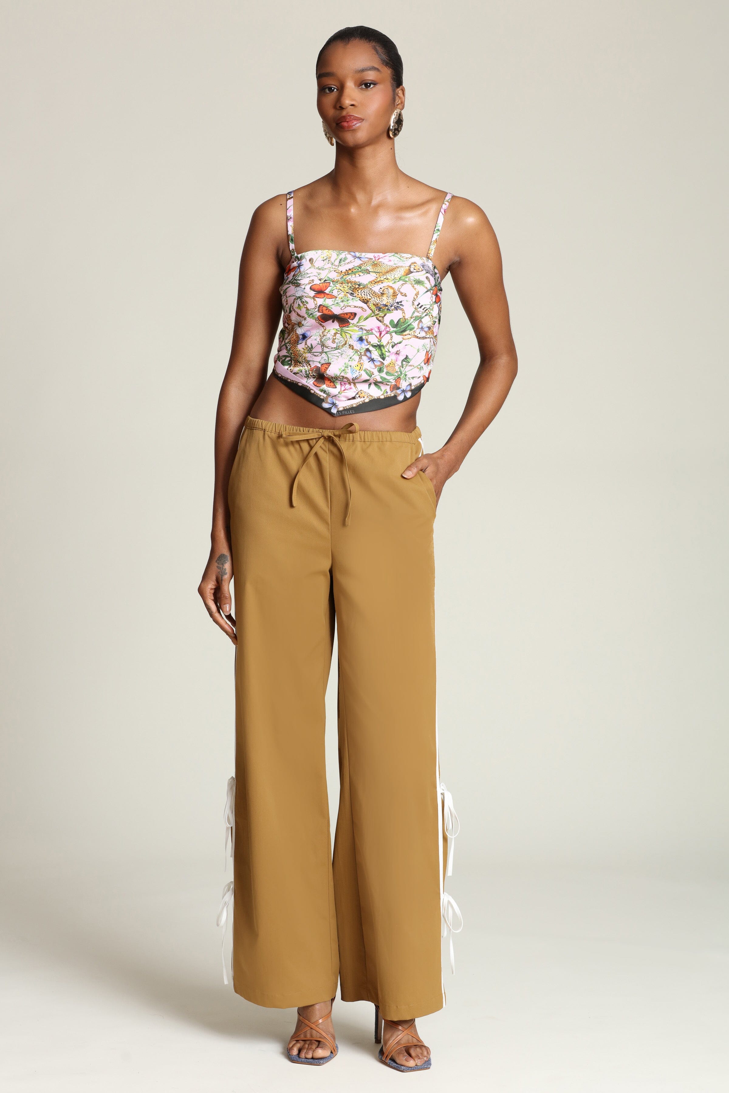 Side-tie brown wide-leg track pants with side slits and an adjustable drawstring waist - Shop women’s designer track pants by Avec Les Fille