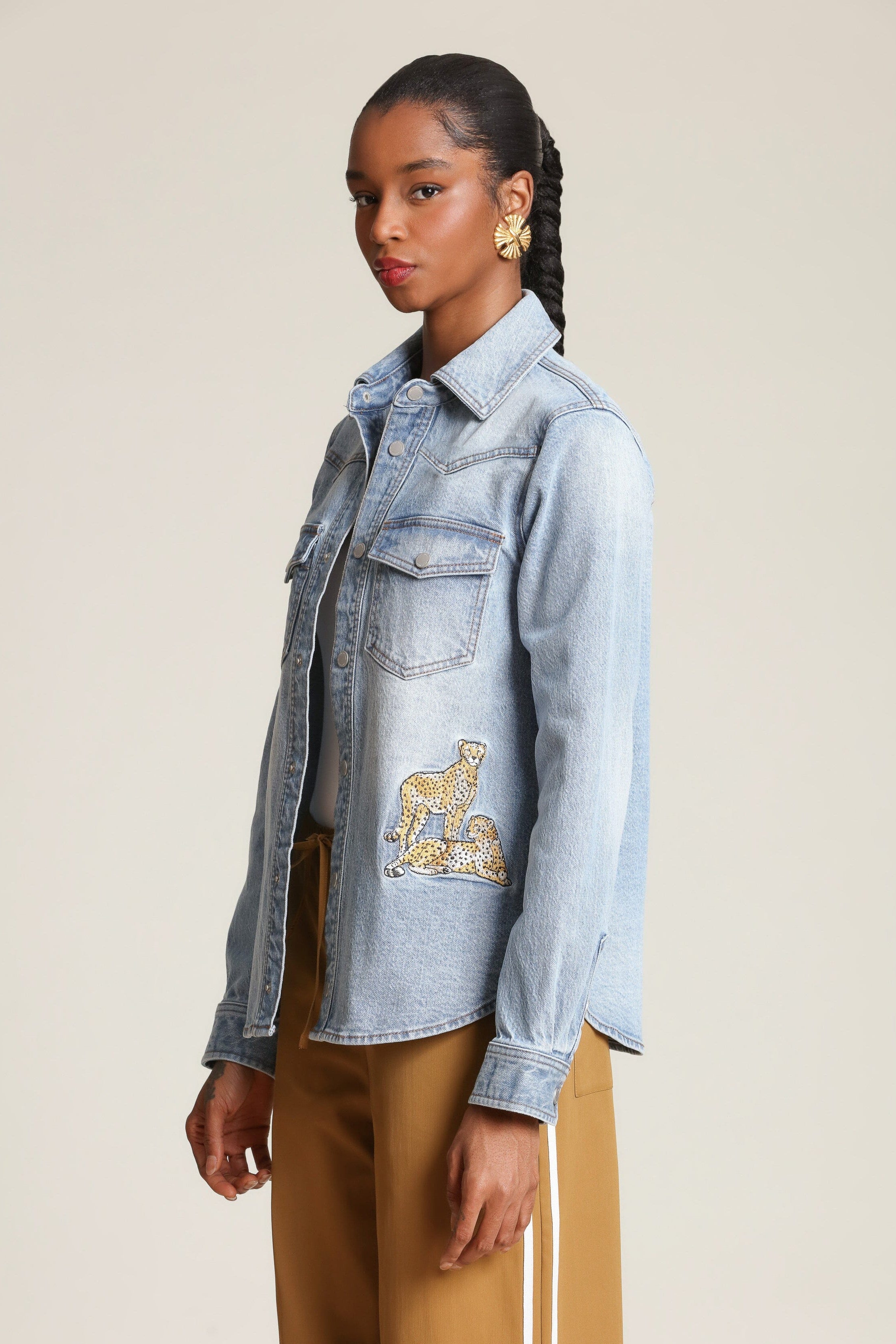 Cheetah patch snap-front blue denim shirt in cotton blend with long sleeves and western yoke detailing - Shop designer women's shirts by Avec Les Filles