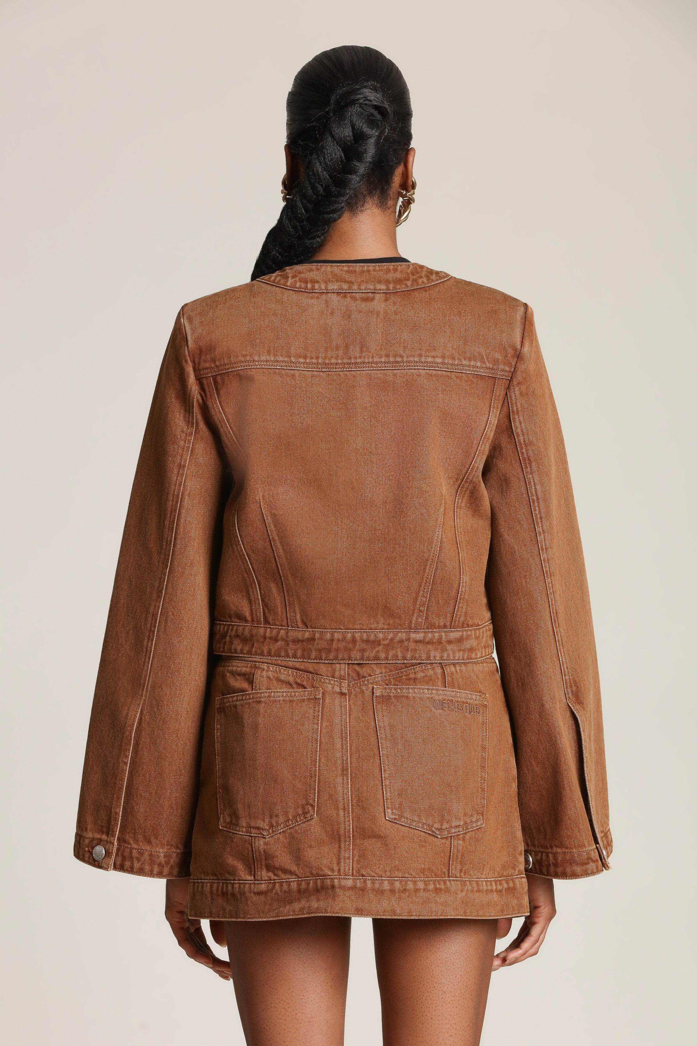Washed maple denim cropped jacket with dramatic sleeves and polished turnlocks by Avec Les Filles