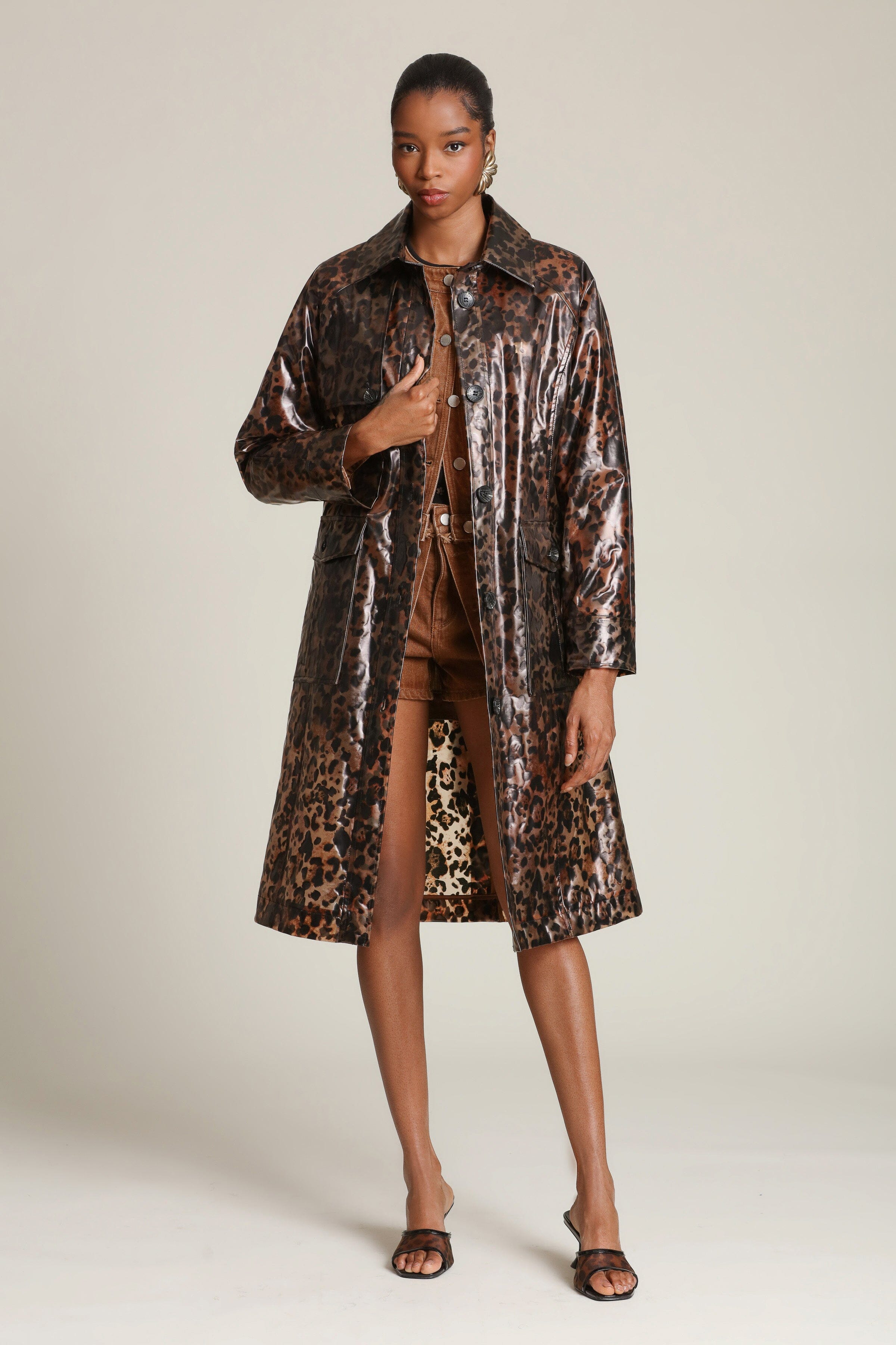 Leopard button-front rain trench coat with long sleeves and an adjustable self-tie belt at the waist - Shop designer women's long trench coats by Avec Les Filles