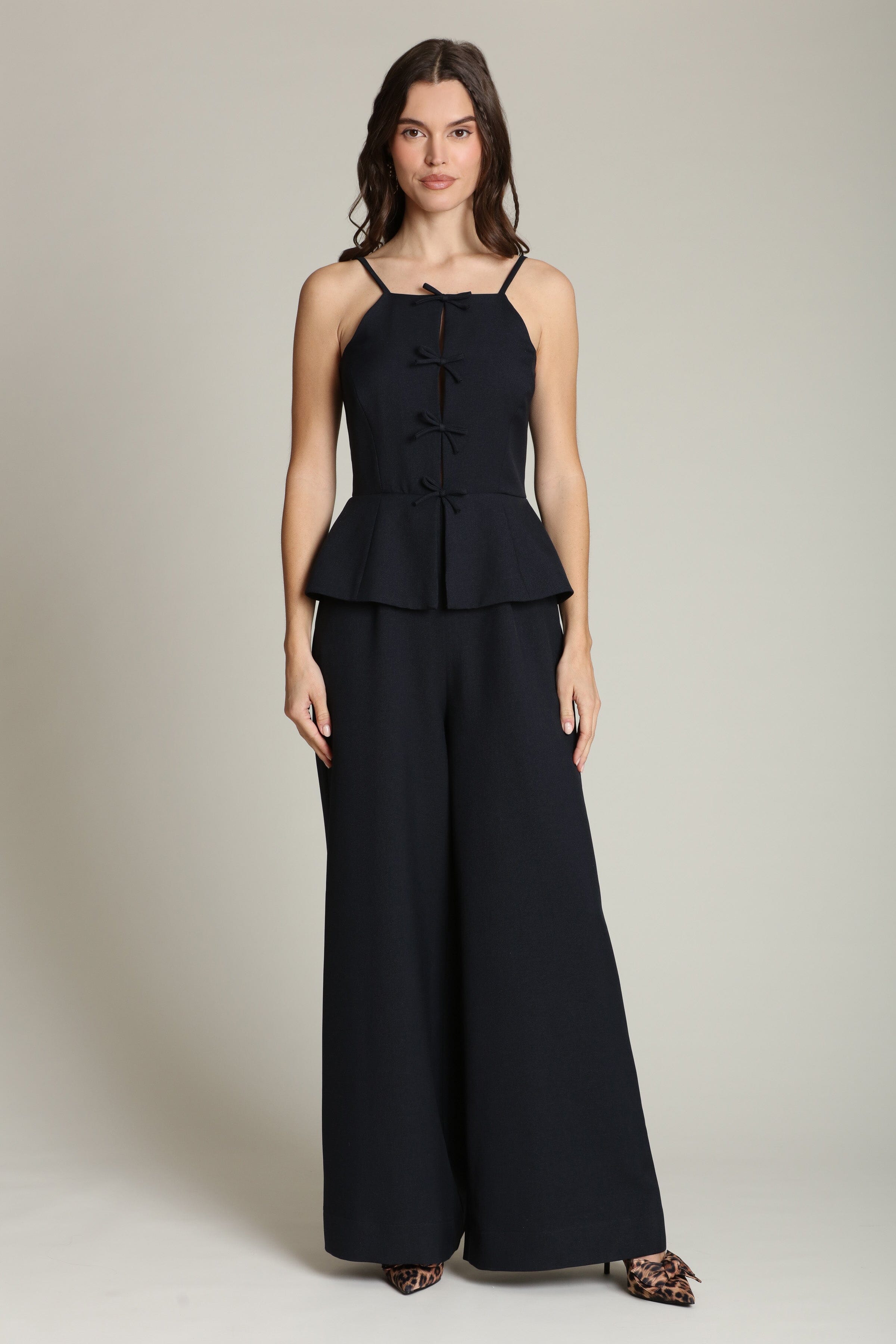 Peplum wide-leg navy jumpsuit with adjustable spaghetti straps and a front tie-front - Women's jumpsuits by Avec Les Filles
