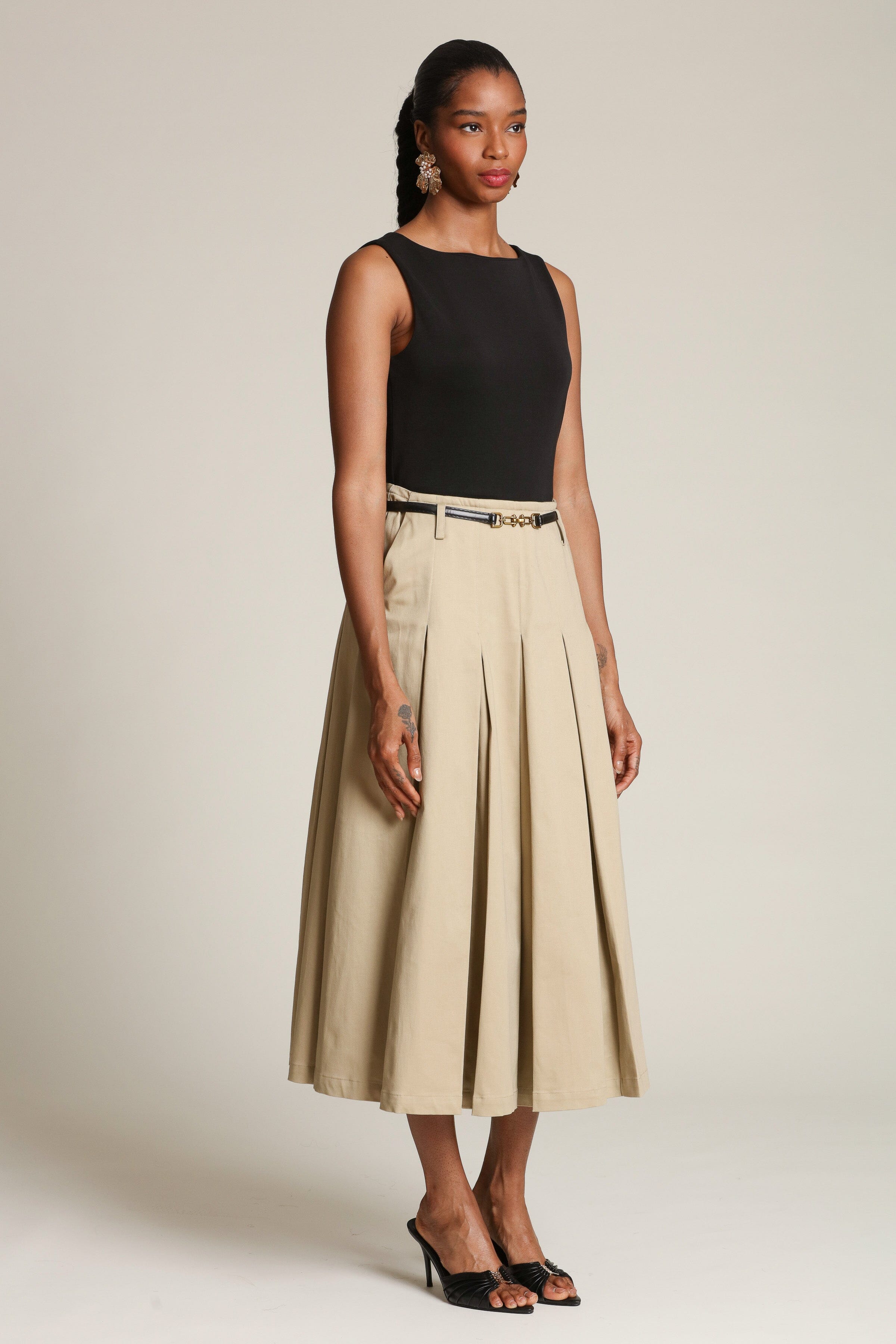 Mixed Media pleated black & khaki midi dress with removable faux leather belt and Pleated midi skirt by Avec Les Filles