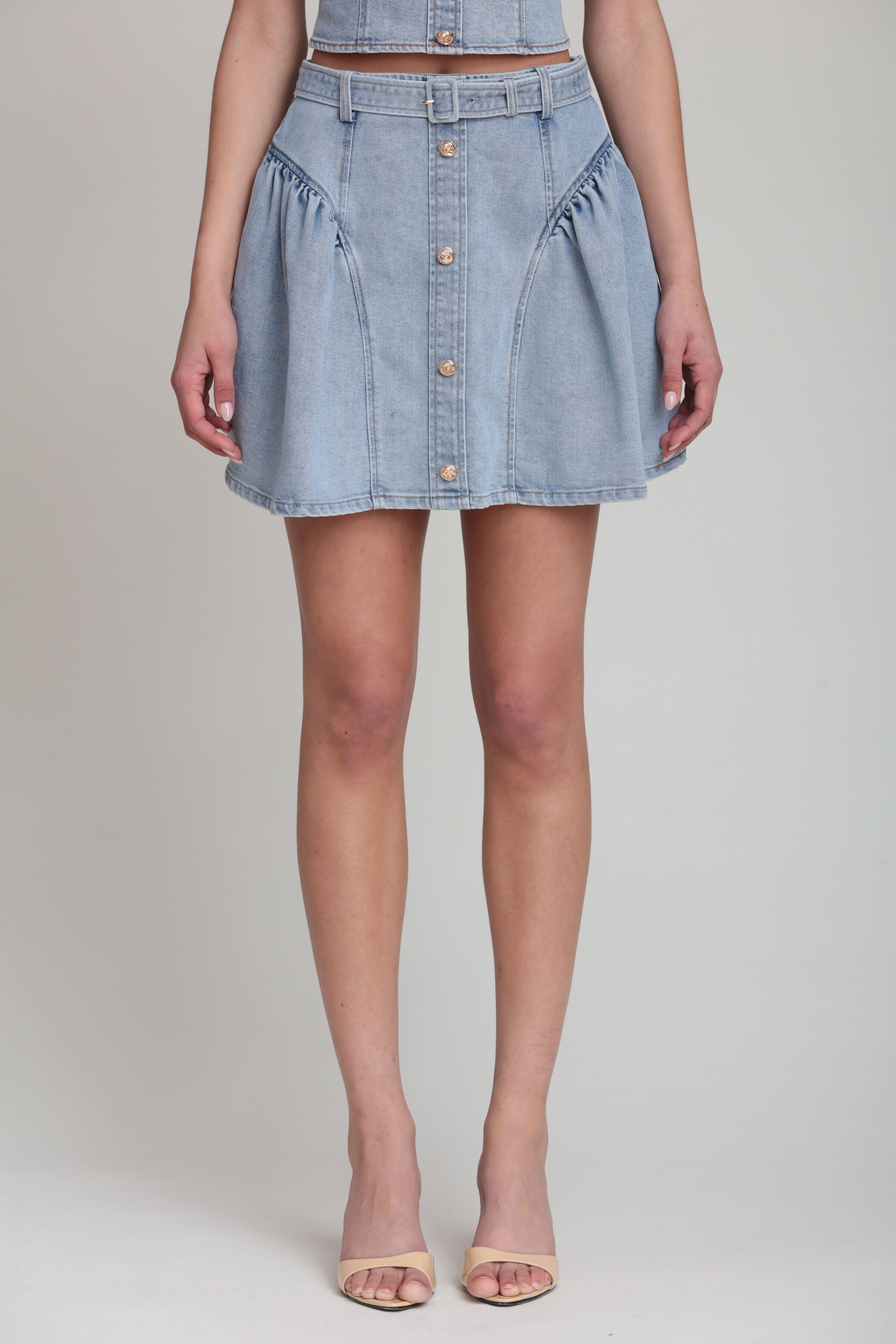 Stretch indigo denim mini skirt in cotton blend with a removable belt and high-rise waist by Avec Les Filles
