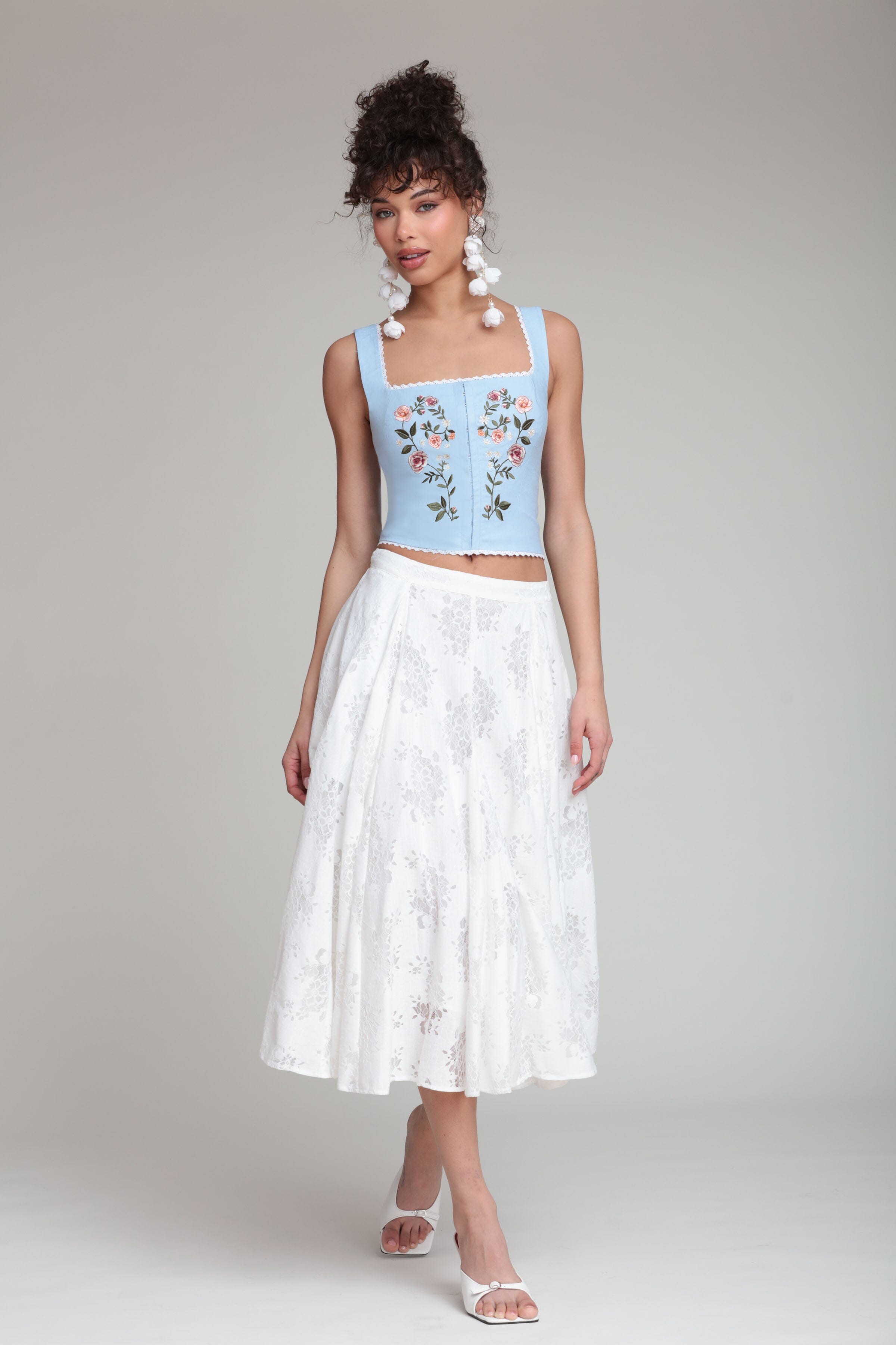 Embroidered stretch light blue linen top with wide shoulder straps and white midi skirt by Avec Les Filles
