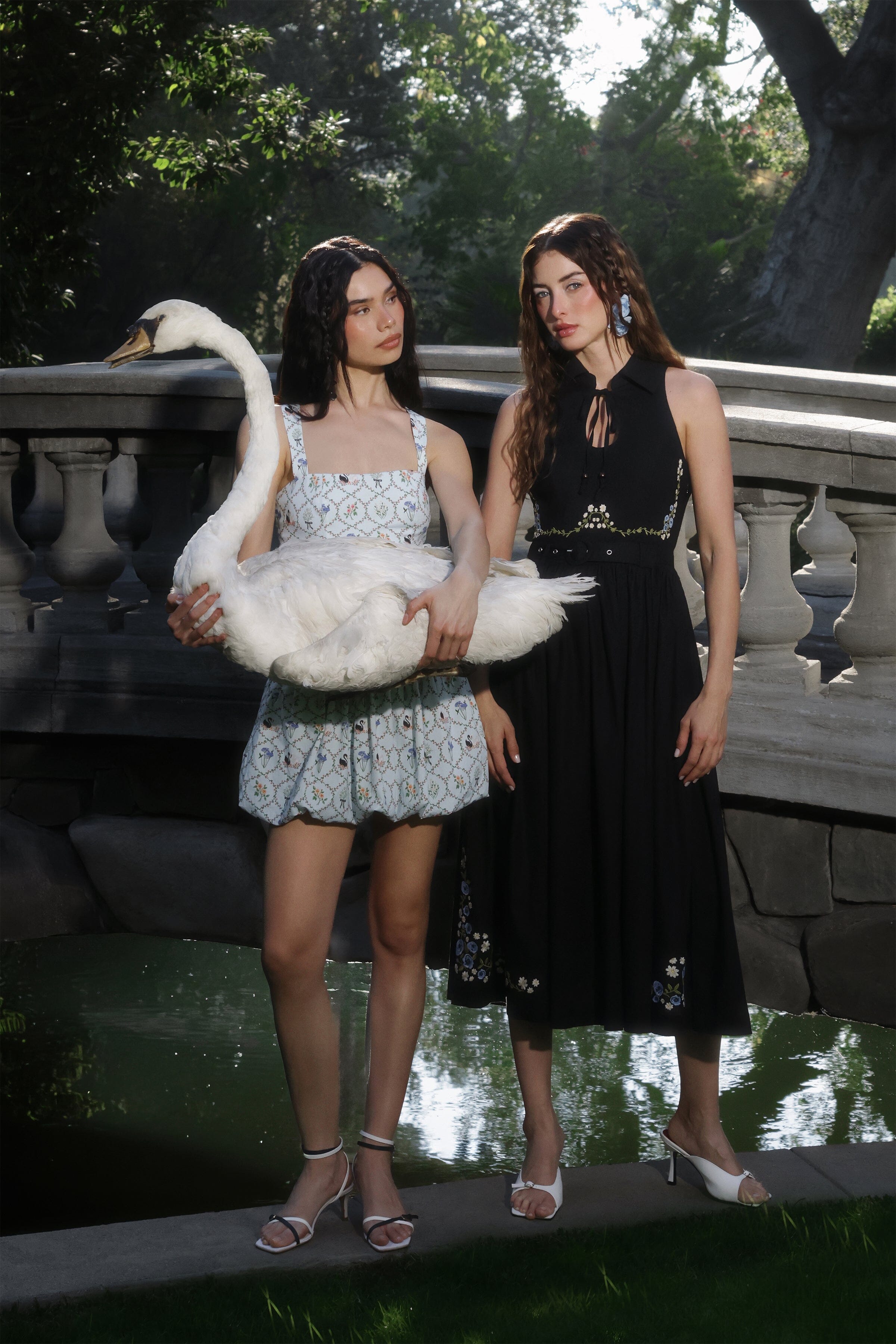 Embroidered linen blend sleeveless black midi dress with blue printed mini dress by Avec Les Filles