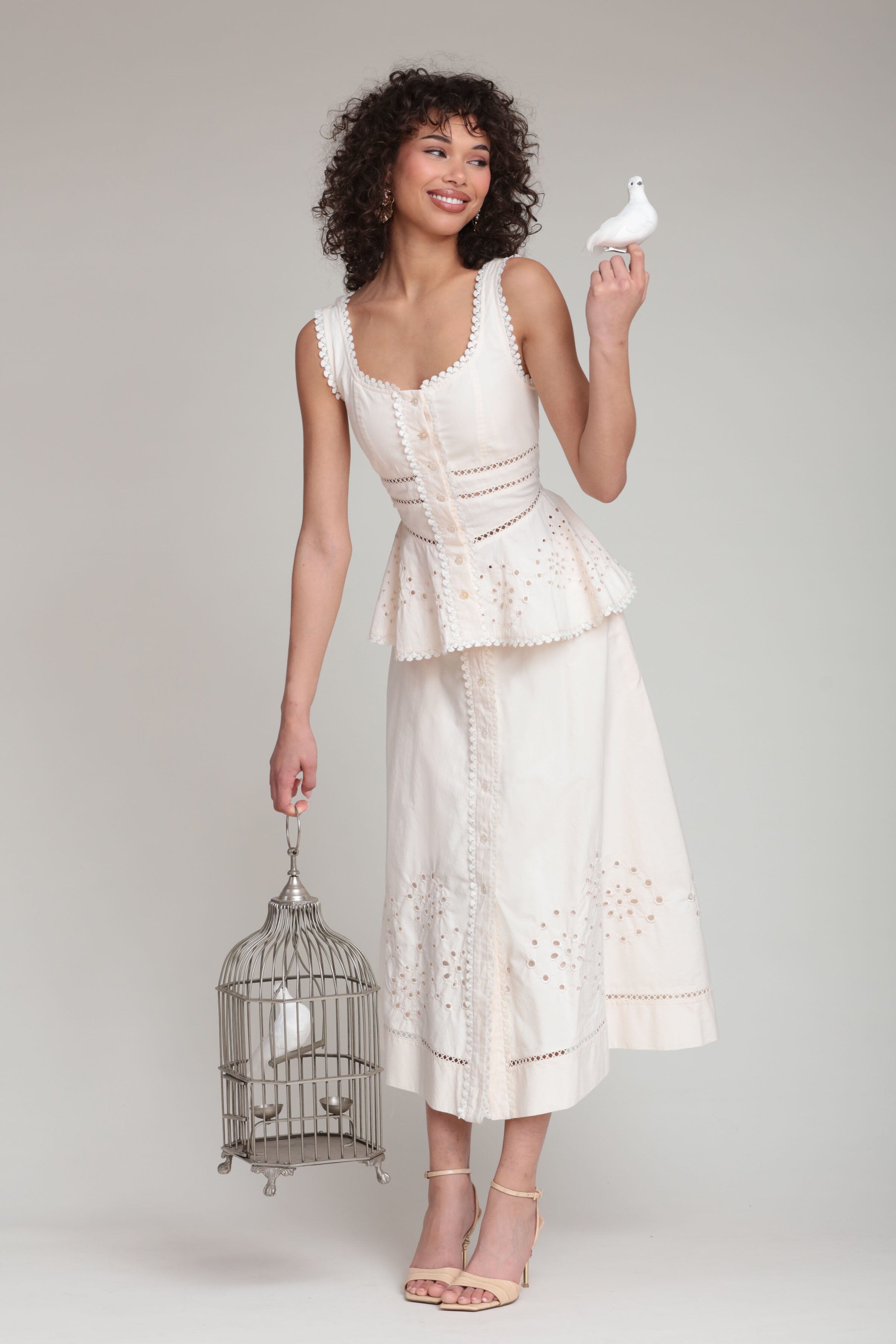 cotton embroidered cream sleeveless peplum tank top with white midi skirt by Avec Les Filles