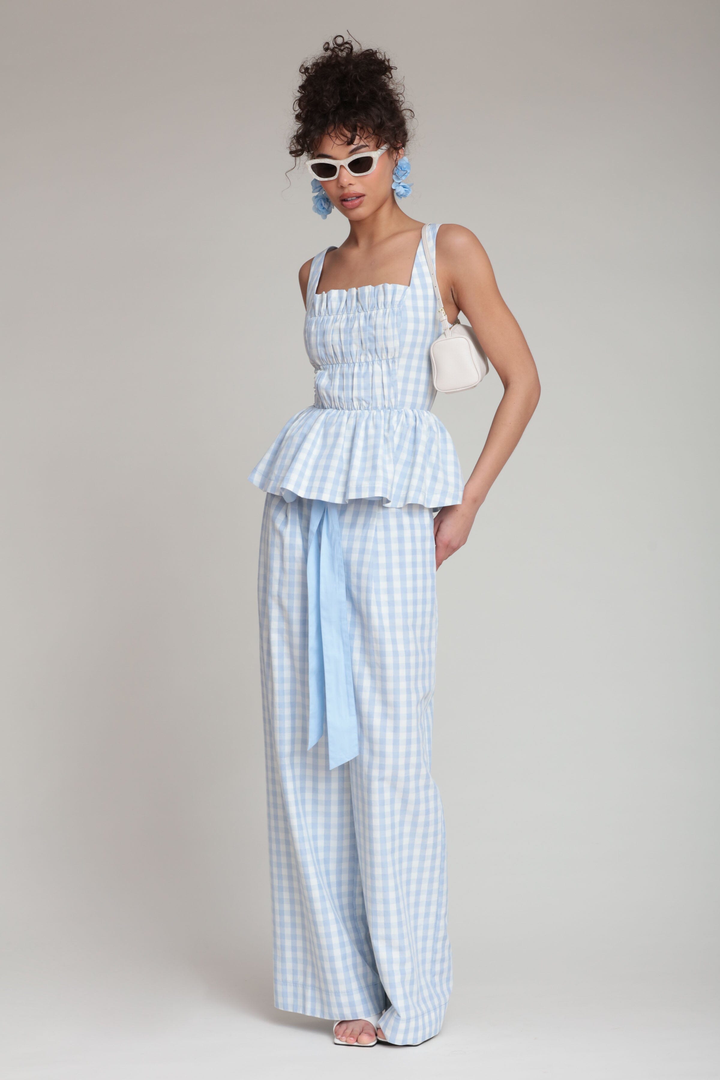 Gingham light blue wide leg pant with a high-rise and a belt. Shop women's cute wide leg pants by Avec Les Filles
