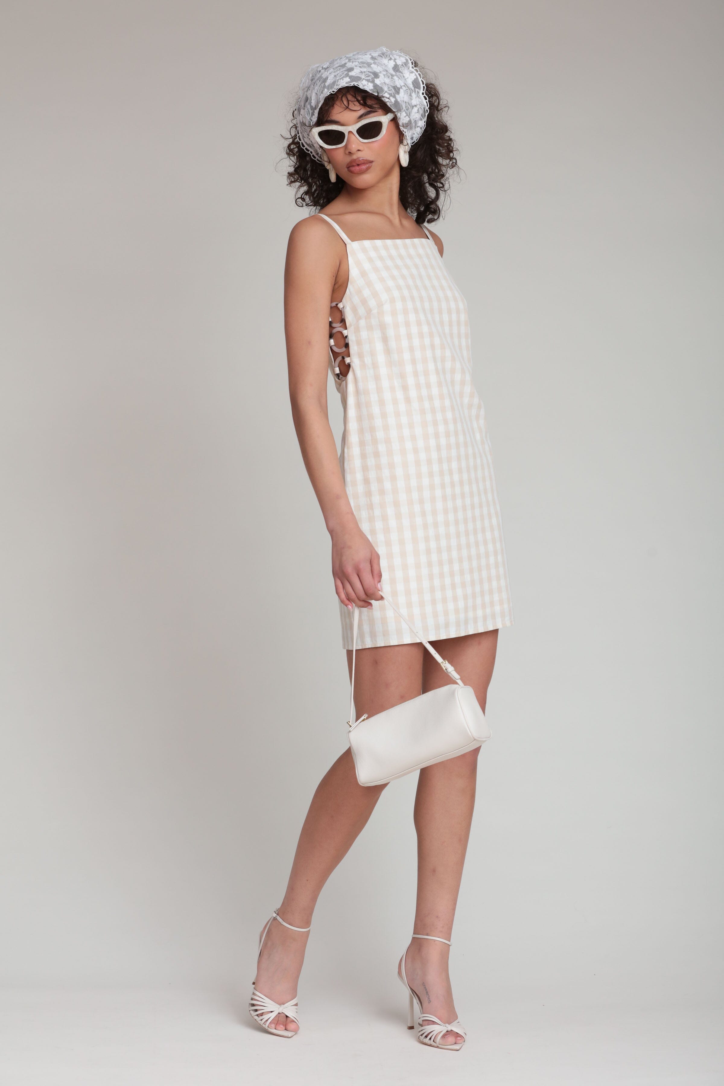 Seersucker beige sleeveless gingham mini dress with boat neckline and shift fit by Avec Les Filles